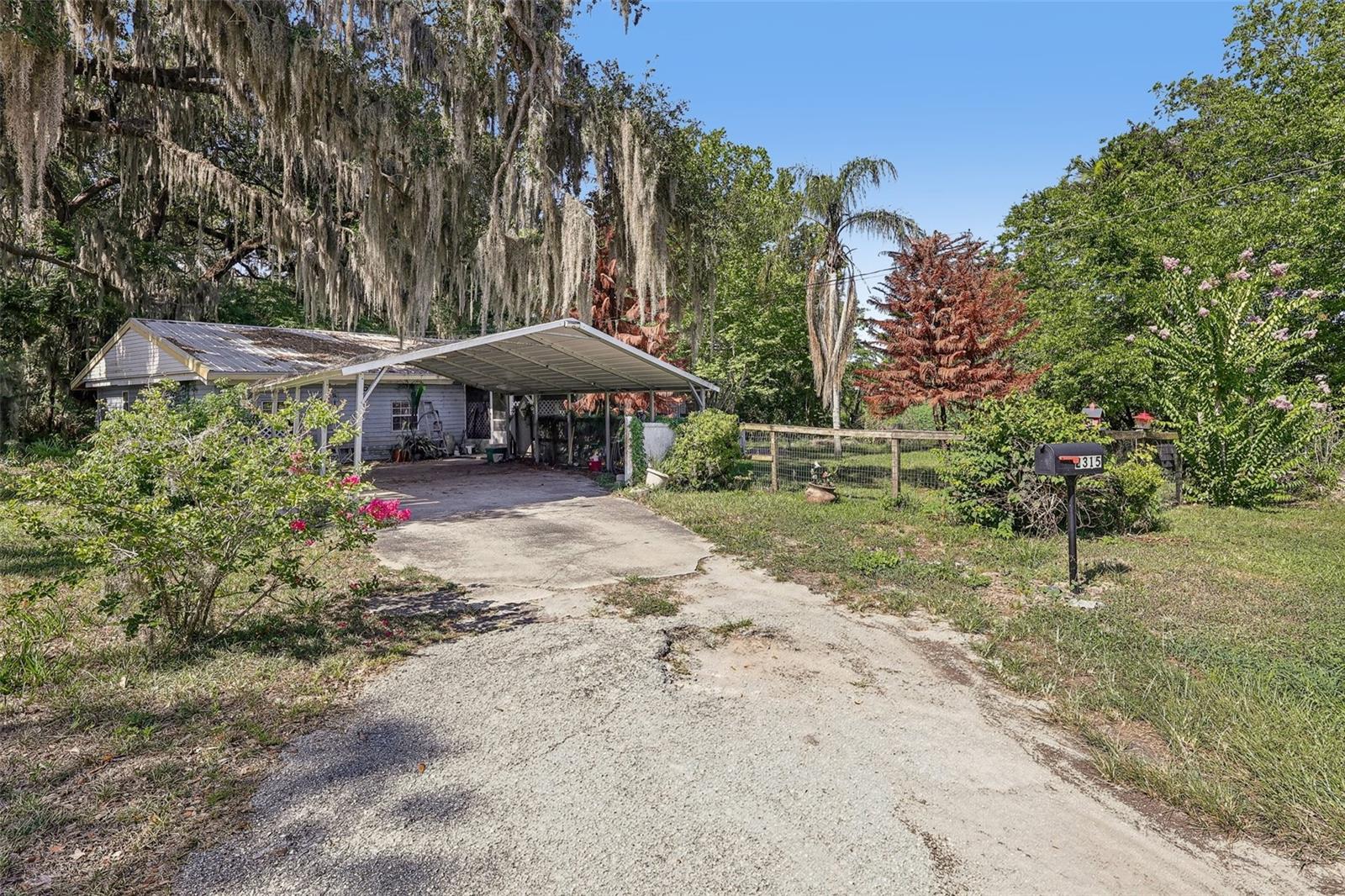 Welcome home to this house full of potential with 3 bedrooms and 2 baths nestled on a spacious oversized corner lot in the heart of Leesburg. Offering 1,489 square feet of thoughtfully designed living space, with the kitchen as the heart of the home. This home has a 4th bedroom that is ready to be finished and could easily add just over 100 square feet and instant equity. 

Step inside to discover a bright, inviting interior featuring fresh kitchen open to the living room, and a of windows for natural light. The updated kitchen offers plenty of cabinet space and functionality, while the comfortable bedrooms and split floorplan provide the perfect retreat at the end of the day. A metal roof installed 2016, with concrete block construction add lasting value and peace of mind.

Outside, you'll love the expansive yard with endless possibilities for entertaining, gardening, parking your boat or creating your own outdoor oasis. there are multiple outdoor sheds for extra storage. This home is conveniently located just minutes from downtown Leesburg, shopping, dining, parks, schools, and the area's beautiful lakes, this home offers both comfort and convenience.

Whether you're a first-time homebuyer, downsizing, or looking for a great investment opportunity, this charming property is one you won't want to miss. Schedule your private showing today!