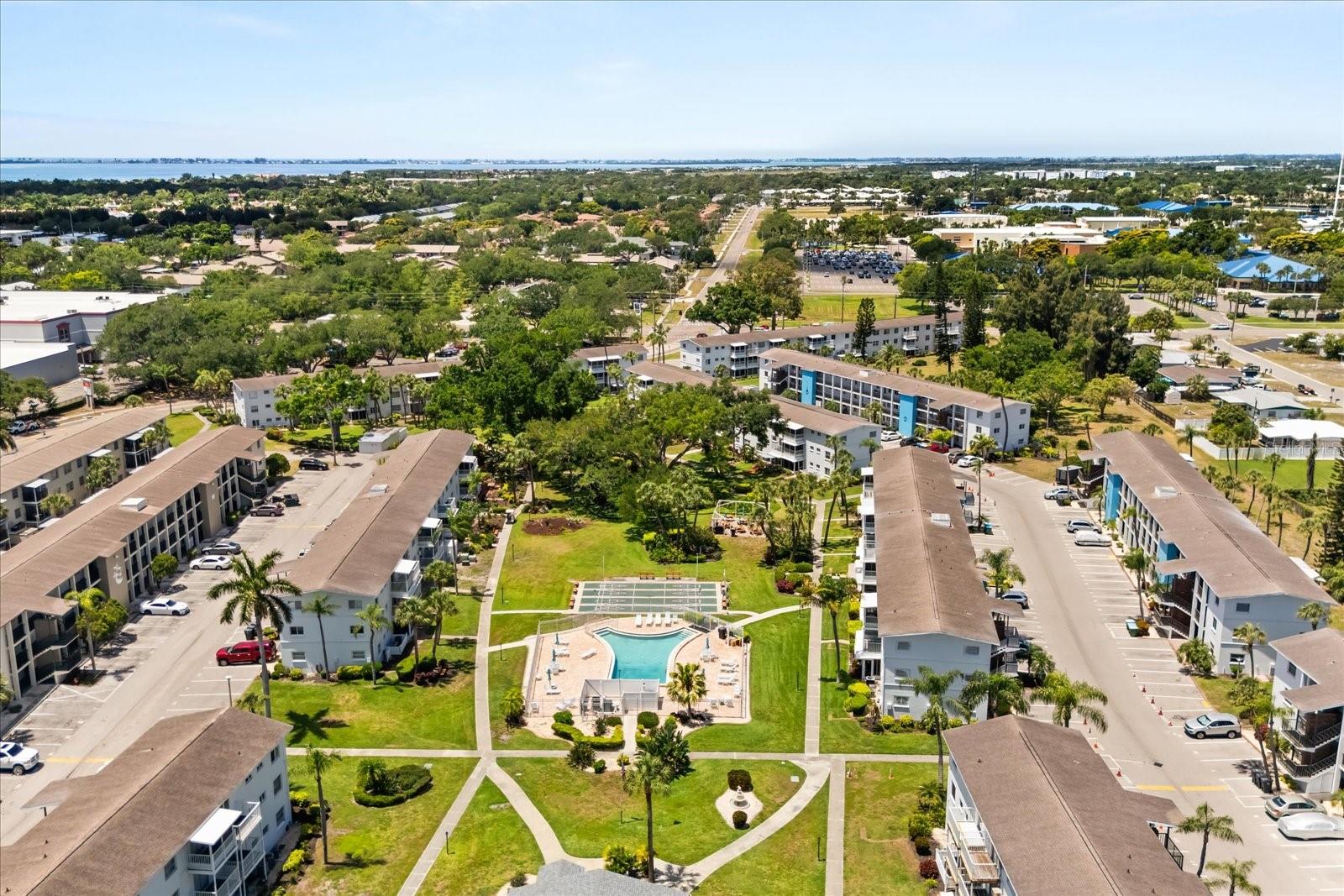 **RARE Perfectly remodeled turn-key condo that's Fully Furnished!** This charm presents an incredible opportunity for buyers seeking a move-in ready residence in this prime Florida location. This fully remodeled condo combines charm with modern upgrades, making it an ideal retreat or investment property. 

Step inside to discover a beautifully renovated interior featuring fresh paint, new flooring, and ultra-modern finishes throughout. The kitchen boasts newly upgraded countertops and cabinetry, complemented by new appliances that marry style and functionality. All cookware and cutlery included, this place is ready for you. The family room and dining area have been thoughtfully upgraded to create a welcoming, versatile space perfect for entertaining friends or relaxing after a day at the nearby beaches or community pool. The cozy bedroom offers ample closet space and a peaceful ambiance, ensuring restful nights. The bathroom has been upgraded with new countertops, fixtures, and vanity, adding to the home’s modern appeal.

Step outside to enjoy the private back patio, ideal for outdoor dining, relaxing in the Florida sunshine, or soaking in the tranquil surroundings. The view of the park with huge banyon tree makes it feel really special. The 2022 A/C system ensures the home stays cool and comfortable, while the 2024 water heater guarantees reliable hot water. There's a bonus storage room on the exterior hallway of this same floor, perfect for storing your beach gear. Elevator right down the hall. The exteriors of all buildings in the community were just renovated in 2025-2026 as well- Sharp modern-looking community. 

Community amenities are outstanding, with a reasonable HOA fee granting access to a refreshing pool, lush park with gardens, shuffleboard courts, and a vibrant community hall and office that hosts numerous activities. This friendly neighborhood fosters a welcoming atmosphere perfect for both relaxation and social engagement. Located close to everything Bradenton has to offer—including beautiful beaches, shopping, dining, and the international airport—you’ll enjoy a truly convenient lifestyle.

This exceptional condo combines modern upgrades, a fantastic location, and vibrant community living. Whether you’re looking for a vacation retreat, a year-round residence, or an investment opportunity, this property ticks all the boxes. Don’t miss your chance to own this beautifully upgraded Florida condo—schedule your private tour today and experience the perfect blend of comfort, style, and community living in Bradenton before this rare beauty is gone!
