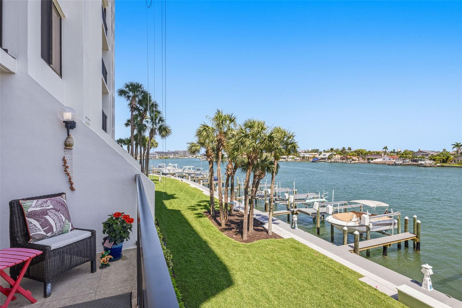 AUG-DEC ONLY!!!!! LIVE THE WATERFRONT LIFESTYLE in this beautifully furnished 2 BEDROOM / 2 BATH condo in the desirable Intrepid building in the Yacht & Tennis Club of St. Pete Beach! Located on the second floor, this bright and open condo offers stunning Intracoastal Waterway views where you can watch dolphins swim by from the comfort of your patio. Features include a spacious primary suite with walk-in closet and private bath, guest bath with walk-in shower, and in-unit stacked washer and dryer. Enjoy resort-style amenities including a waterfront heated pool and spa, clubhouse, fitness center, sauna, tennis courts, shuffleboard, and a brand new boardwalk to stroll around the marina. Conveniently located near Gulf beaches, dining, shopping, and entertainment. Water, sewer, trash, cable, and internet are ALL INCLUDED — tenant only pays electricity. No pets. No smoking.