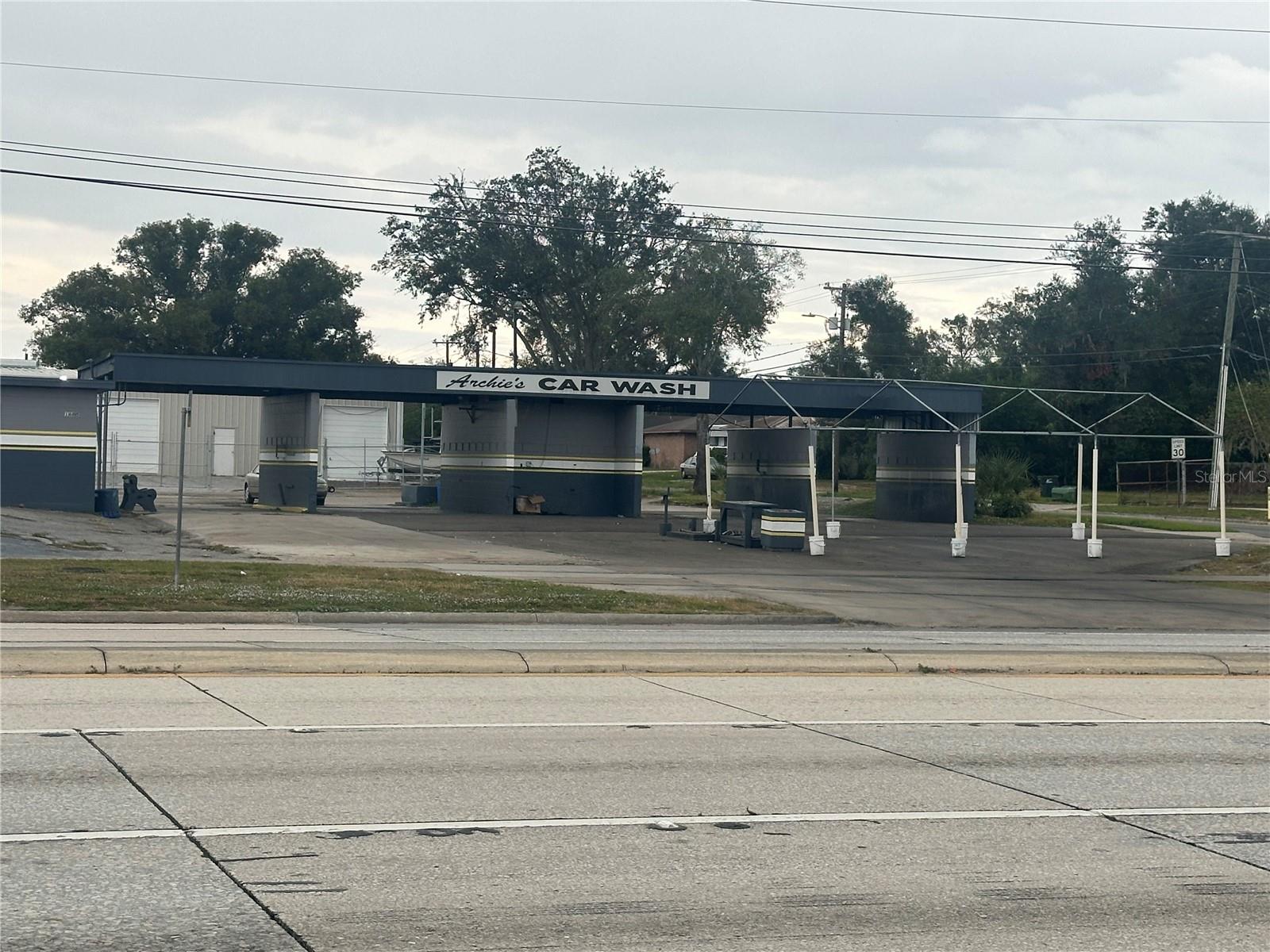 Prime commercial property at 1605 W Memorial Blvd, Lakeland, FL, offering 2,910 sq. ft. of space on a 0.5-acre lot. This high-visibility corner location is perfect for various business opportunities.*******Reduced Price********