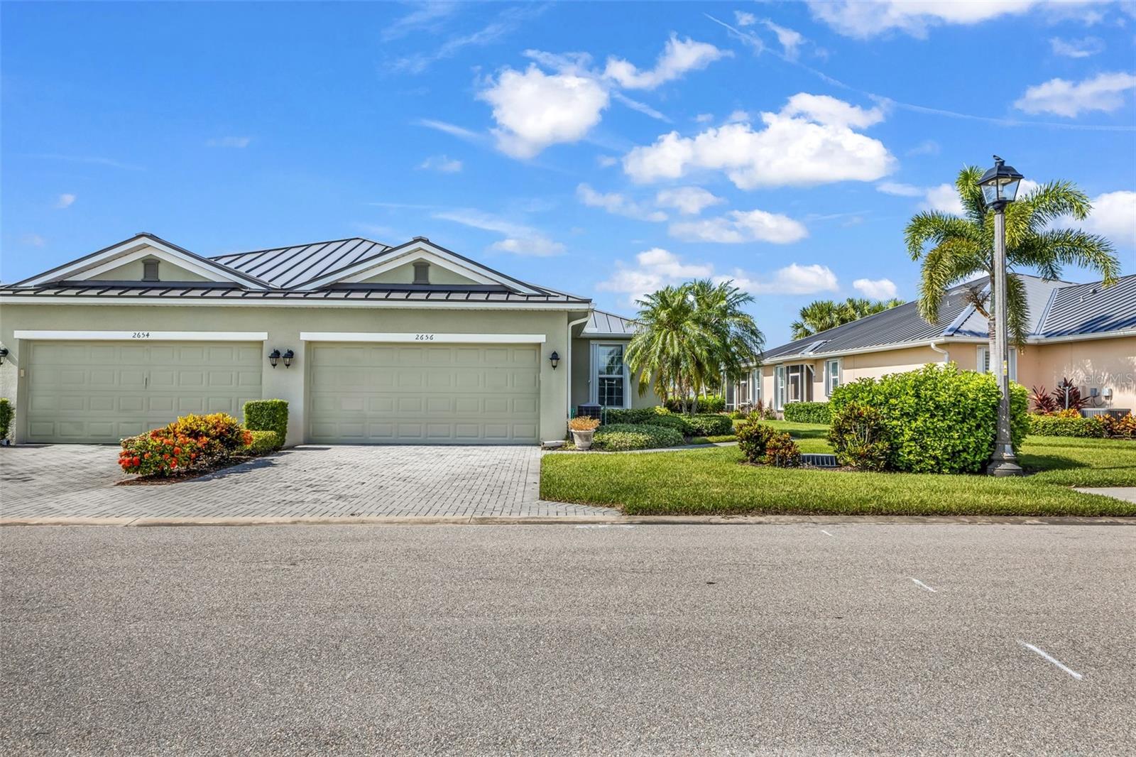 Welcome to the fabulous, highly sought-after community of Sandoval in Cape Coral! This bright, cheery, and immaculately maintained villa boasts over 1,500 square feet of pristine living space, featuring two spacious bedrooms, two bathrooms, a versatile den, and a formal separate dining room—perfectly suited for a winter retreat or your permanent retirement paradise. The heart of the home features real wood cabinetry and gorgeous granite countertops. Relax in the expansive primary suite, complete with a generous walk-in closet, while the comfortable guest bedroom offers ample privacy for your out-of-town winter visitors. Additional features include a spacious two-car garage and a private back lanai—the ultimate spot to enjoy your morning coffee or evening beverage while watching Southwest Florida’s diverse wildlife. The community of Sandoval is chock-full of activities designed to keep your daily calendar as full or as relaxed as you want. Picture yourself lounging by the massive, resort-style lagoon pool, enjoying friendly matches on the basketball, volleyball, tennis, and pickleball courts, or exploring miles of scenic, winding walking and jogging paths. Your four-legged family members will love social hour at the two dedicated dog parks, while the kids or grandkids make memories at the community playground. Throw in a fully equipped fitness center and a peaceful fishing pier, and it’s easy to see why this vibrant neighborhood truly has it all.