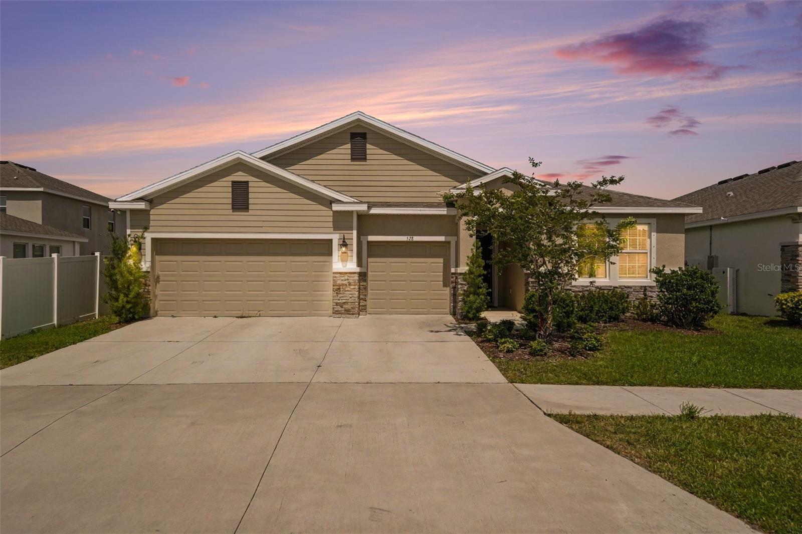 Welcome to 528 Ocean Spray Drive in Ruskin—a beautifully maintained, move-in ready home built in 2021, offering 4 bedrooms, 3.5 bathrooms, and 2,820 square feet of thoughtfully designed living space in the sought-after Shell Cove community.

This spacious open-concept floor plan features soaring ceilings, elegant tile flooring, and abundant natural light throughout. The heart of the home is the chef-inspired kitchen, complete with granite countertops, stainless steel appliances, ample cabinetry, and a large center island perfect for entertaining and everyday living.

A standout feature is the private in-law suite with its own separate entrance, providing exceptional flexibility for multigenerational living, guests, a home office, or potential rental income opportunities.

Step outside and enjoy Florida living at its finest in the oversized backyard, offering plenty of space for outdoor gatherings, recreation, or future customization.

Residents of Shell Cove enjoy a variety of community amenities, including a resort-style pool, playground, neighborhood park, and scenic walking trails. With a low HOA, no flood insurance requirement, and convenient access to I-75, Tampa, shopping, dining, and grocery stores, this location perfectly balances comfort and convenience.

Adding even more value, qualified buyers may take advantage of an assumable VA loan at an attractive 2.99% interest rate. Plus, a free appraisal and potential lender incentives are available when using the preferred lender.

Don't miss this incredible opportunity to own a modern, versatile home in one of Ruskin's most desirable communities.