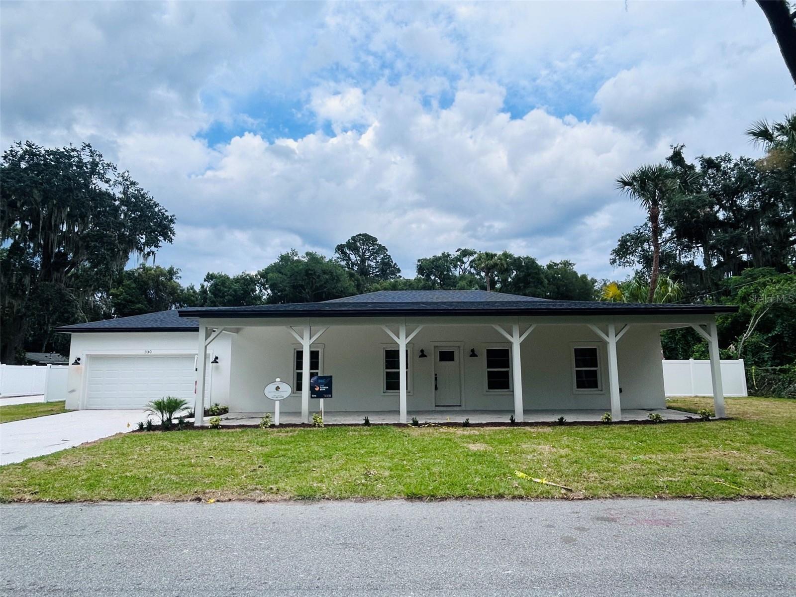 Includes (2) newly built 4 Bedroom 2 Bathroom SFR.  Perfect multi-generational living or investment. Great rental potential.  Best Oviedo School District. Also, zoned commercial.