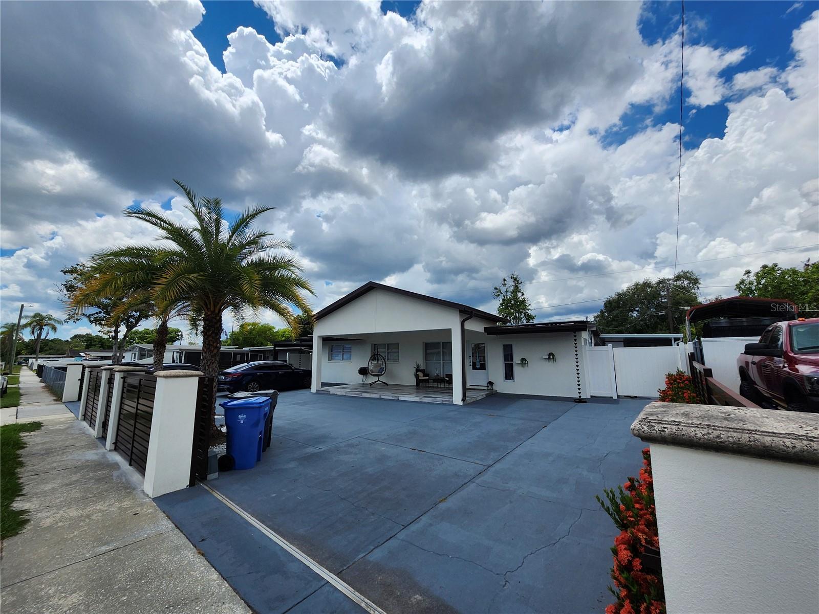 Discover a unique opportunity in Tampa, FL 33619. Some homes are best experienced in person, and this is one of them. From its distinctive layout to its versatile living spaces, every area invites you to explore and imagine the possibilities. The home has been well maintained and features clean, organized interiors throughout. An existing ADU (mother-in-law apartment) provides added flexibility, with additional space that may offer future possibilities, subject to buyer verification of zoning, permitting, and intended use. Step outside and enjoy the private swimming pool along with a spacious climate-controlled outdoor kitchen designed for year-round entertaining. Take a look at the photos, then schedule your private tour to experience everything this property has to offer. It is the responsibility of the Buyer and Buyer's agent to verify the room sizes, room counts, HOA, community rules and restrictions, pet restrictions, deed restrictions, lot size, flood zone, etc. All room sizes are estimated. Please present all offers on FAR-BAR As-Is contract with pre-approval or proof of funds.
Security cameras on property. Cameras may record audio and video. Entry into the property constitutes consent to recording.
