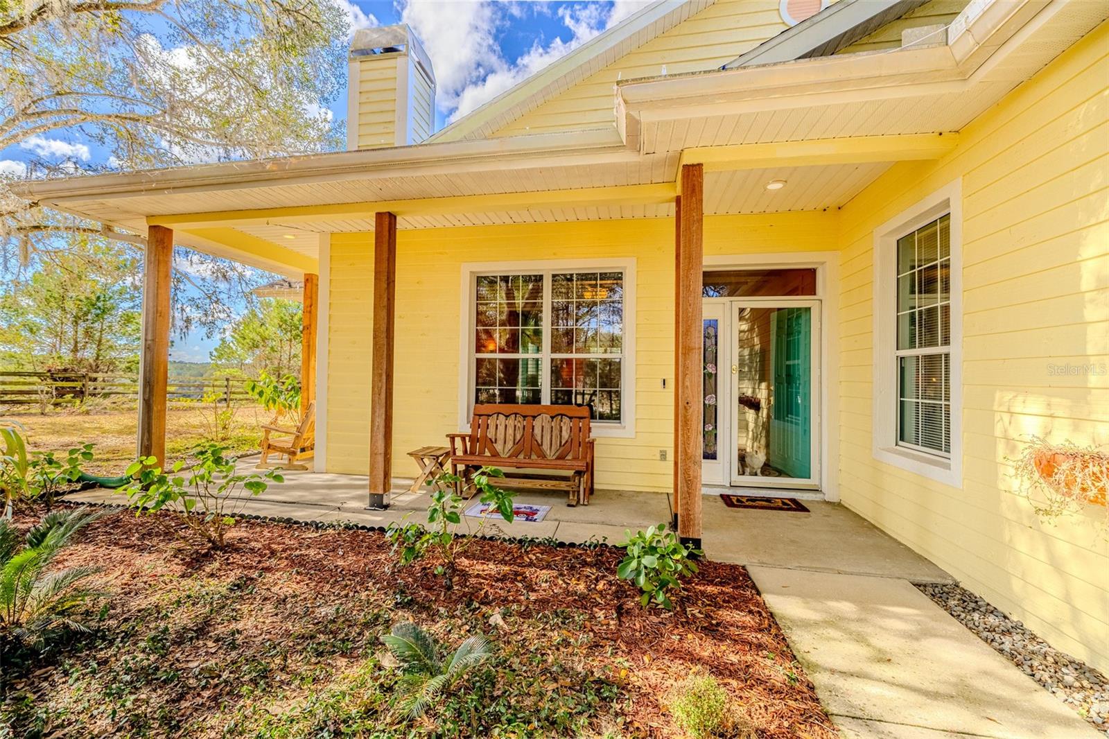 Rare opportunity to own in the established Oak Forest neighborhood. Location is close to the Hernando county line located off of US Hwy 41. Home is located on a cul-de-sac and situated on a large lot with no HOA. Custom built block home offering 3 bedrooms and 2 bathrooms, with a 2 car garage. As you walk up to the home you are greeted by the front wraparound patio that offers scenic views of the neighboring 60 acre pasture. Entering the home you will notice the custom tile work in the foyer and beautiful Hickory hardwood floors throughout the living areas and bedrooms. Living room has a wood burning fireplace & large, lighted storage closet. Living room and separate dining areas allow for plenty of space for entertaining guests. Dining room has tray ceiling. Kitchen offers island with breakfast bar and dual sinks. Ample cabinet space with slide out shelves on the bottom cabinets. Breakfast nook is perfect for quick meals. The enclosed sun room has large windows to enjoy the country view and is equipped with a mini split AC with heat. For cooler nights warm yourself by the potbelly stove while making a hot beverage. Primary bedroom features tray ceiling, walk in closet with custom shelving. Bedroom is oversized and allows access to the garage. Primary bathroom has been updated with new vanity, toilet, shower, jacuzzi tub and flooring. Secondary bedrooms have large, lighted closets and ceiling fans. Hall bathroom has also been updated with new toilet, shower, and flooring. Washer and dryer hookups are in the garage. Water heater is new. AC condenser is two years old. Home has central vac system. Location provides easy access to major highways.