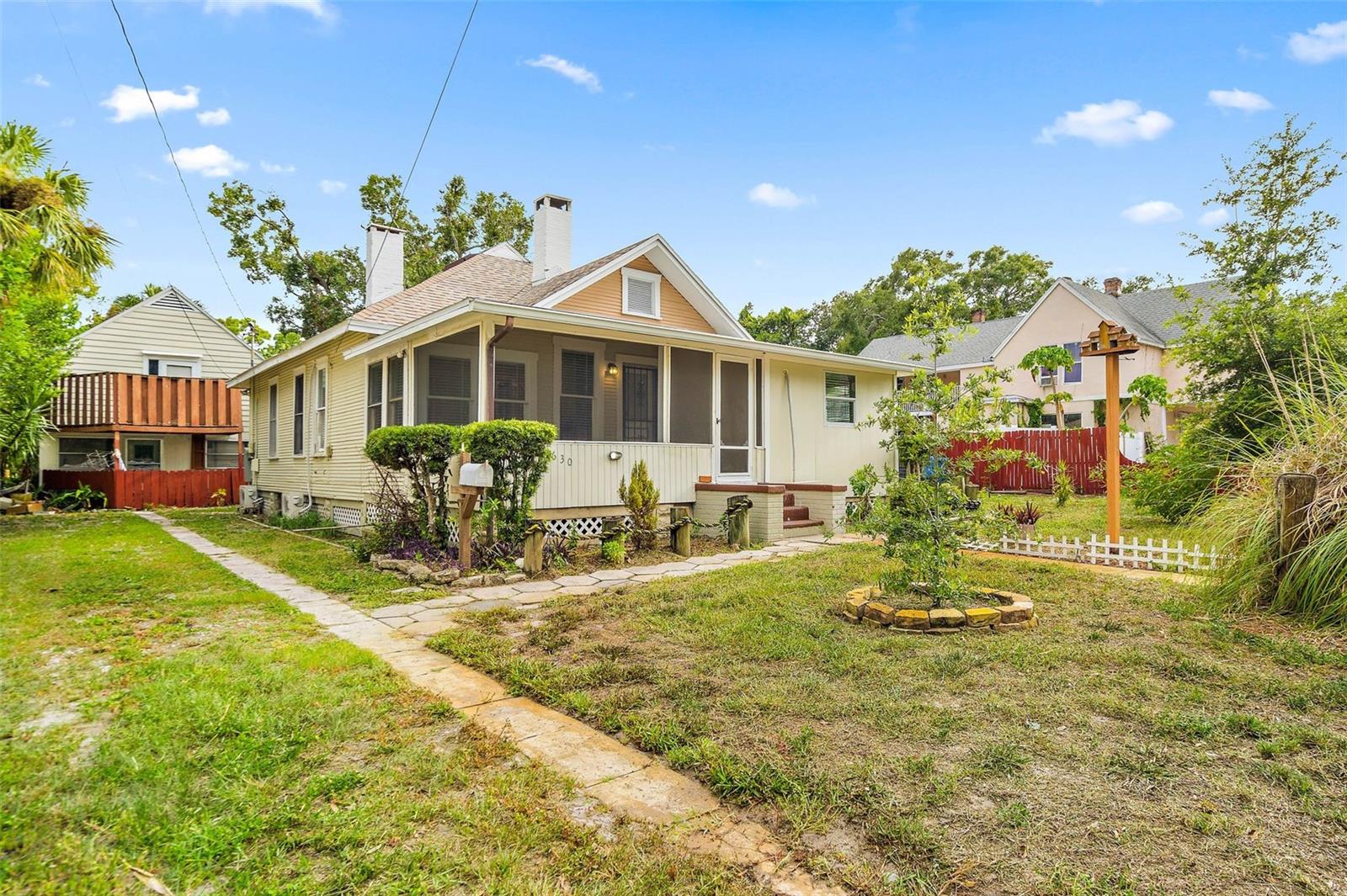 Welcome to the Big Bayou Bungalow! Located on a brick street, this 3/2 Single Family Home is only steps from Big Bayou, Grandview Park & Boat Ramp, Lake Maggiore and Boyd Hill Nature Preserve. This charming bungalow is sure to please anyone looking for that historic St. Pete vibe! This home features two fireplaces, one which is double sided, built-ins and an old southern screened in front porch. The kitchen is well equipped with marble countertops, stainless steel appliances, tons of storage and a breakfast nook. The primary bedroom features a fireplace and master ensuite. Laundry is located in the hall bathroom. There's plenty of room to enjoy outdoors as the house is situated on a huge lot that is shared with a carraige house out back, with plenty of off street parking available. Conveniently located minutes from Downtown St. Pete, major roads and interstate, airports and local beaches. Come check out this charmer today! First, and 1 month's rent security deposit required for move-in. $40/month pet rent and $500 refundable pet deposit. Renter insurance that covers the pet is required. Meet and greet also required.