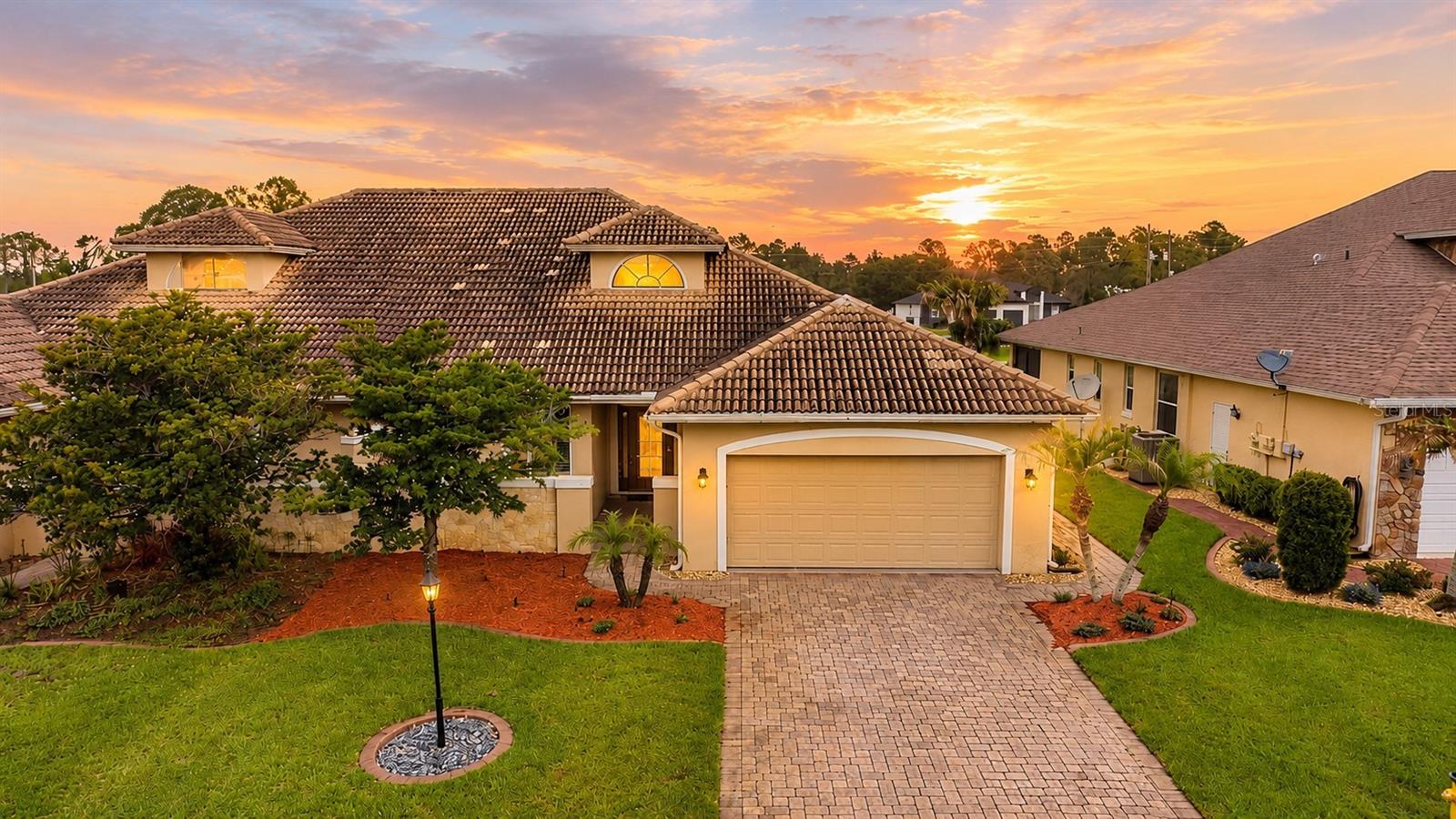 Welcome home to this beautifully maintained 3-bedroom, 2-bath villa nestled in the desirable Magnolia Place community in the heart of Sun 'N Lake. From the moment you arrive, you'll appreciate the paver driveway, private courtyard entrance, and impressive 20' high foyer that creates a grand first impression.

Designed with both comfort and style in mind, the open-concept floor plan is filled with natural light and showcases crown molding, wide baseboards, French doors, and a blend of tile, wood, and laminate flooring throughout. The spacious living and dining areas flow seamlessly into the kitchen, featuring white staggered cabinetry, granite countertops, stainless steel appliances, and plenty of storage for everyday living and entertaining.

The primary suite is a true retreat, complete with French doors, a tray ceiling, hardwood flooring, dual closets including a walk-in closet, and a spa-inspired ensuite bath offering a jetted soaking tub, glass-enclosed walk-in shower, double vanity, and private water closet.

Two additional bedrooms provide flexibility for guests, a home office, or hobby space, while the guest bath features a convenient tub/shower combination. The inside laundry room offers abundant cabinet space and a utility sink for added convenience.

Step outside and enjoy Florida living at its finest. Sliding glass doors fully open to a spacious screened lanai with tile flooring, creating the perfect space for morning coffee, evening relaxation, or entertaining friends and family.

Ideally located near Sun 'N Lake's golf courses, parks, lakes, medical facilities, shopping, dining, and community amenities, this exceptional villa offers the perfect combination of elegance, convenience, and low-maintenance living. Schedule your private showing today!