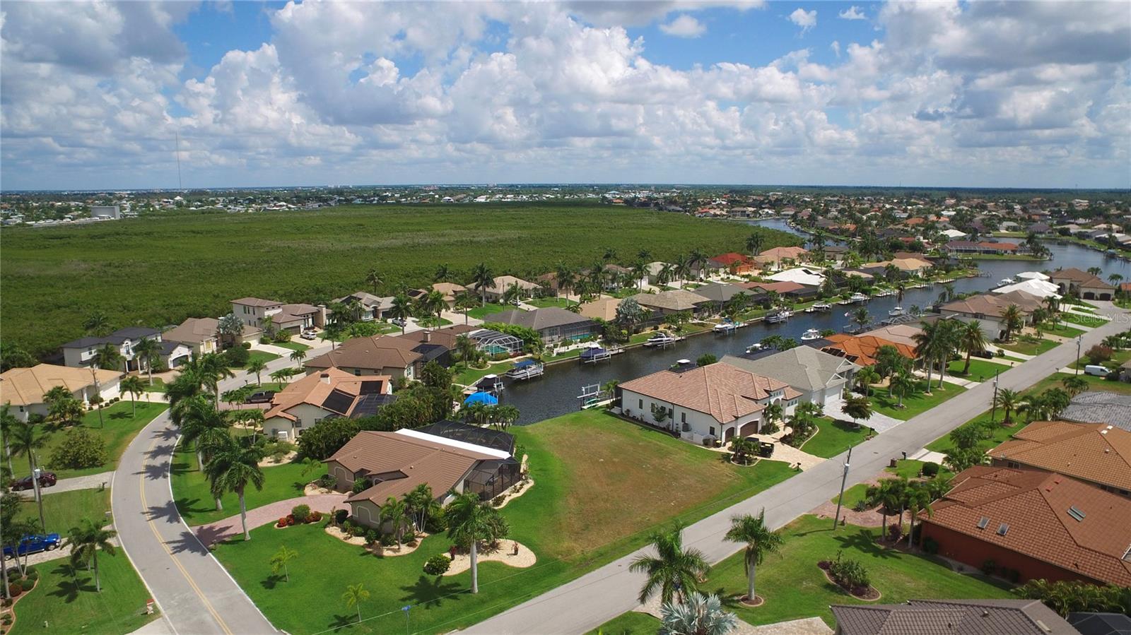 Build your Southwest Florida home on this exceptional waterfront homesite with no bridges to Charlotte Harbor.  Recent improvements to the Burnt Store Isles canal access system include a widened 40-foot navigable passage enhancing marine access to the community’s waterfront canal network.  Positioned on a canal-front lot with quick access to Charlotte Harbor via Alligator Creek, this deed-restricted neighborhood is known for its beautiful custom homes, boating lifestyle, and golf course surroundings. Burnt Store Isles offers a peaceful residential setting while being just minutes from historic downtown Punta Gorda with its waterfront parks, restaurants, boutiques, and year-round community events.

Enjoy the Florida lifestyle with nearby boating, fishing, golfing, tennis, walking and biking paths, and easy access to Charlotte Harbor and the Gulf waters beyond. The nearby Twin Isles Country Club features golf, tennis, and social opportunities for those seeking an active lifestyle. Conveniently located near shopping, medical facilities, I-75, and Punta Gorda Airport, this location combines tranquility with accessibility. Whether you envision a seasonal retreat or year-round residence, this waterfront property offers an outstanding opportunity to create your own piece of paradise in one of Punta Gorda’s premier waterfront communities.