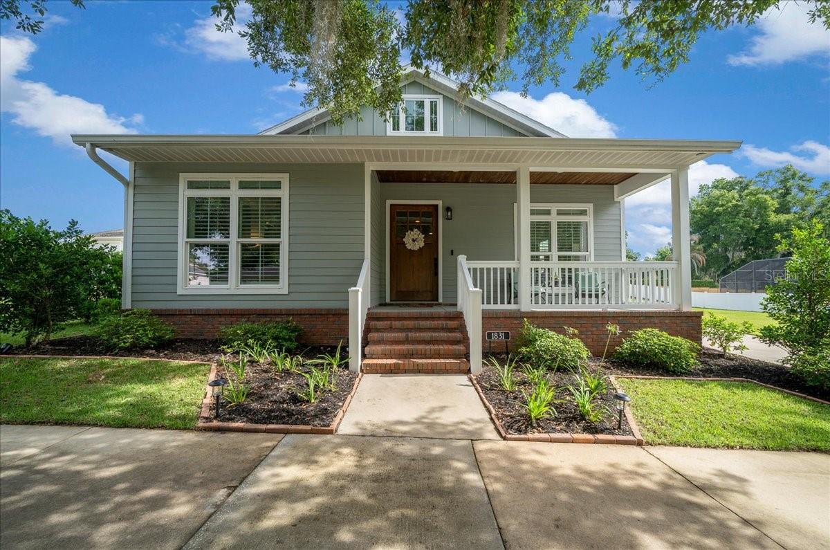 Welcome to this beautifully maintained 2018 home located in the sought after neighborhood of Woodfield Crossing, just minutes from downtown Ocala where you'll enjoy convenient access to shopping, dining, and entertainment. Offering over 2,200 square feet of thoughtfully designed living space, this 3-bedroom, 2.5-bath home combines comfort, style, and functionality in a wonderful community complete with sidewalks and a park area perfect for families, dog walks, and evening bike rides. Inside, you'll love the open floor plan and warm, inviting feel created by the bamboo flooring and thoughtful details throughout. Large barn doors provide privacy between the living areas and bedrooms, while a charming mudroom off the covered entry adds both character and convenience. The gorgeous chefs kitchen is truly the heart of the home-featuring granite countertops, stainless steel appliances including a gas range, an oversized island for gatherings, an abundant amount of counter space, plus a walk-in pantry! The generously sized primary suite offers a relaxing retreat with a beautiful ensuite bath featuring a double vanity, a large tiled walk-in shower, and an impressive walk-in closet. The inside laundry room is equally practical, offering tiled floors, extensive cabinet storage, and newer washer and dryer that will convey with the home. Outdoor living is just as impressive as the interior. The heated saltwater pool can be enjoyed year-round and features a relaxing sun shelf, perfect for soaking up the Florida sunshine. Spend your mornings with coffee on the covered lanai or unwind in the evenings surrounded by brick pavers and lush landscaping. A convenient half bath with direct access from the pool area makes entertaining effortless.. Additional highlights include a 240 charge port under the portico and an oversized garage equipped with air conditioning with plenty of room for vehicles, boats or all those holiday decorations! Plus it also has a generous amount of attic storage above. Major updates provide peace of mind, including a new HVAC system in 2023, water heater 2026, and new pool pump 2026. Beautifully appointed inside and out, and situated in a premier location, this exceptional home offers the perfect blend of modern touches, thoughtful upgrades, and a welcoming community atmosphere. This is one you'll want to see in person.