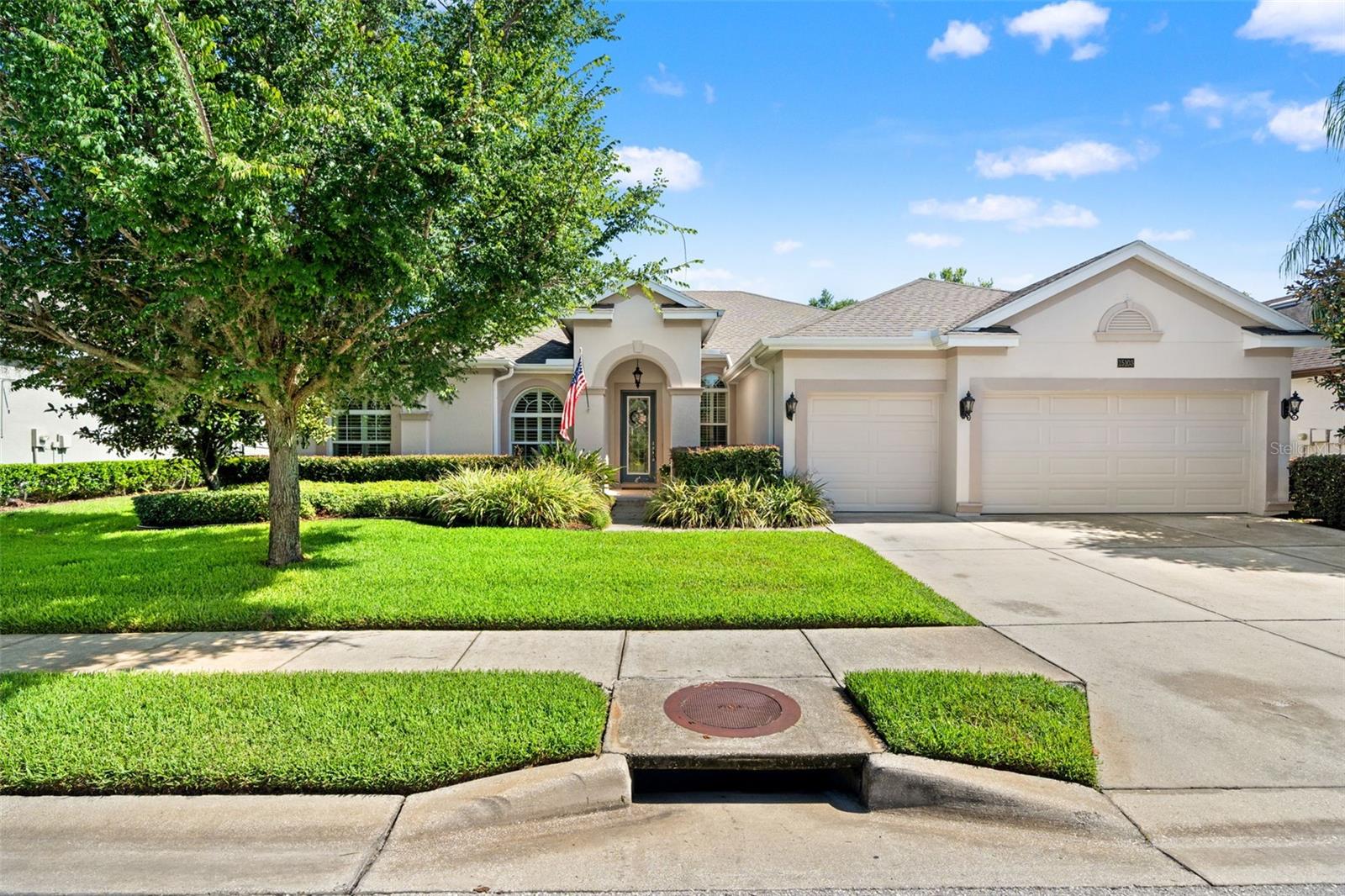 Welcome to this exceptional one-owner home located in Gray Hawk at Lake Polo, one of Odessa’s most desirable communities. Offering 4 spacious bedrooms, 3 full bathrooms, a dedicated office, and an ideal split floor plan, this residence provides the perfect blend of elegance, comfort, and functionality.

From the moment you enter, you will appreciate the high ceilings throughout the home, abundant natural light from large windows, and thoughtfully designed details throughout. The spacious main living areas feature new flooring, plantation shutters, and an inviting layout perfect for both everyday living and entertaining. The home offers a formal living room, formal dining room, expansive family room, and a bright breakfast nook overlooking the backyard. The well-appointed kitchen features a large center island, ample cabinetry, and an eat-in dining area, making it the heart of the home.

The luxurious primary suite features double tray ceilings, creating an elegant retreat with plenty of space and comfort. A private in-law suite offers excellent flexibility for multigenerational living, guests, or a private retreat, while the dedicated office is perfect for working from home. Additional highlights include built-in closets and a spacious 3-car garage providing ample room for vehicles, storage, and hobbies.

Step outside to enjoy the screened lanai, complemented by an additional paver patio that’s perfect for grilling, relaxing, or entertaining. The expansive backyard is surrounded by mature trees and lush landscaping, offering plenty of room to build your dream pool and create your own private outdoor oasis.

Lovingly maintained by its original owner, this home also offers exterior hurricane shutters for added peace of mind, NO flood insurance required, low HOA fees, and NO CDD fees. Located within the prestigious guard-gated community of Gray Hawk at Lake Polo, residents enjoy a welcoming neighborhood atmosphere with amenities including a playground, tennis courts, and sidewalks perfect for evening strolls.

Conveniently located in prime Odessa, this home offers easy access to Tampa Airport, Our beautiful Florida Beaches, shopping, dining, and major highways. This beautifully maintained residence offers the perfect combination of space, privacy, and timeless appeal in one of Odessa’s most sought-after communities. Schedule your private showing today!