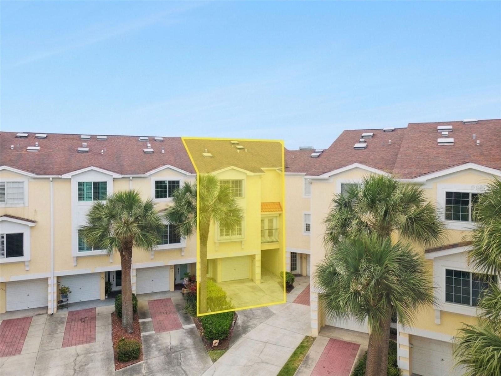 Set within a gated, waterfront community in Oldsmar, this expansive townhouse at 137 Brent Circle offers a rare combination of space, thoughtful upgrades, and true Florida coastal living, complete with your own private, recently upgraded boat slip just steps out the back door.

Featuring 3 bedrooms, 2 bathrooms, and approximately 2,300 square feet, this is one of the largest units in the neighborhood, ideally positioned at the end of a cul-de-sac for added privacy. The layout is both functional and versatile, offering expansive living areas, a large dining room, and flexible spaces perfect for a rec room, home office, or art studio, all enhanced by abundant natural light and gorgeous water views throughout.

What truly sets this home apart is its direct connection to Upper Tampa Bay, where dolphins, manatees, and native wildlife are often seen. Enjoy ridiculously beautiful water views from dual balconies, perfectly positioned for both sunrise and sunset, because here, the lifestyle is just as important as the home itself.

The kitchen has been professionally remodeled and architecturally designed, with renovations thoughtfully planned by an architect and interior designer, serving as a stunning focal point of the home. Additional interior upgrades include luxury flooring throughout, fresh interior paint, custom stair railing, and beautiful ceiling fans that elevate both style and comfort. The primary suite features a dramatic bath with travertine tile and oversized closets, while a generous laundry room adds everyday convenience.

Practical upgrades provide peace of mind, including a new air conditioning system exceeding current codes and hurricane shutters on every window. The home also features a 3-car tandem garage, offering ample space for vehicles, storage, or recreational gear, with the option to add an elevator in the future if desired.

Step outside to enjoy freshly painted balconies and a newly updated screened enclosure, creating the perfect setting to relax, entertain, and take in the views, because yes, wine really does taste better out here.

The community enhances the lifestyle even further with a pool and hot tub, kayak launch, lighted boardwalk, and an active social committee. Located just minutes from the Safety Harbor boat launch, as well as a variety of restaurants, bars, parks, and entertainment, this home offers both tranquility and convenience. Oldsmar itself is known for its abundance of parks and natural beauty, making it a hidden gem along the Gulf Coast.

**This house comes with a REDUCED RATE through the seller's preferred lender. This is a lender-paid rate buydown that reduces the buyer's interest rate and monthly payment.**
