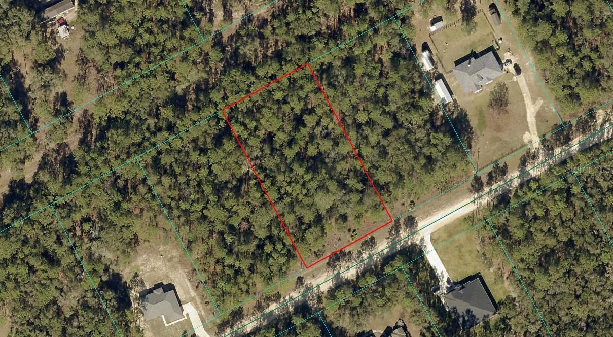 Paved roads almost all the way to the lot from both 484 and 140th. Easy to access from both 129th (paved) and 61st Place Road (paved) and 61st is only one street to the north of the street this lot is on.  Build your home on this 1.14 acre rectangular lot in Rolling Hills Unit 4 (Ocala area of Rolling Hills). You will want to build your new site built home here. This neighborhood is in great demand and there is a lot of new construction going on here. Only 12 minutes to the World Equestrian Center, 20 minutes to Rainbow Springs State Park in nearby Dunnellon. The lot is treed, so you will be able to pick which trees you want to stay on your property. Flood zone X, not in a county prone flood zone either.