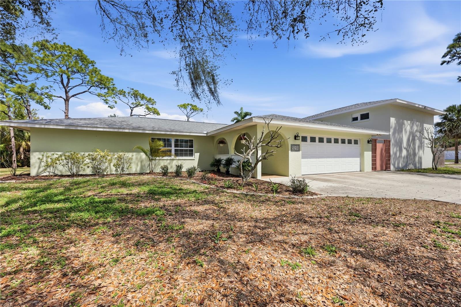 One or more photo(s) has been virtually staged. Rare opportunity! This beautifully maintained 3-bedroom, 2-bath pool home sits on a spacious .65-acre lot with no HOA, offering both privacy and flexibility. The home features wood-look tile throughout and a bright, clean interior. Enjoy seamless indoor-outdoor living with three pocket sliders that open to the pool area—perfect for entertaining or unwinding. The property also includes an additional RV-size garage with endless possibilities for storage, a workshop, or hobby space, plus an extra shed for added convenience. With plenty of room to spread out and enjoy, this property offers the ideal blend of comfort, space, and versatility. Don’t miss the chance to make this unique home your own and enjoy the Florida lifestyle it was designed for.
