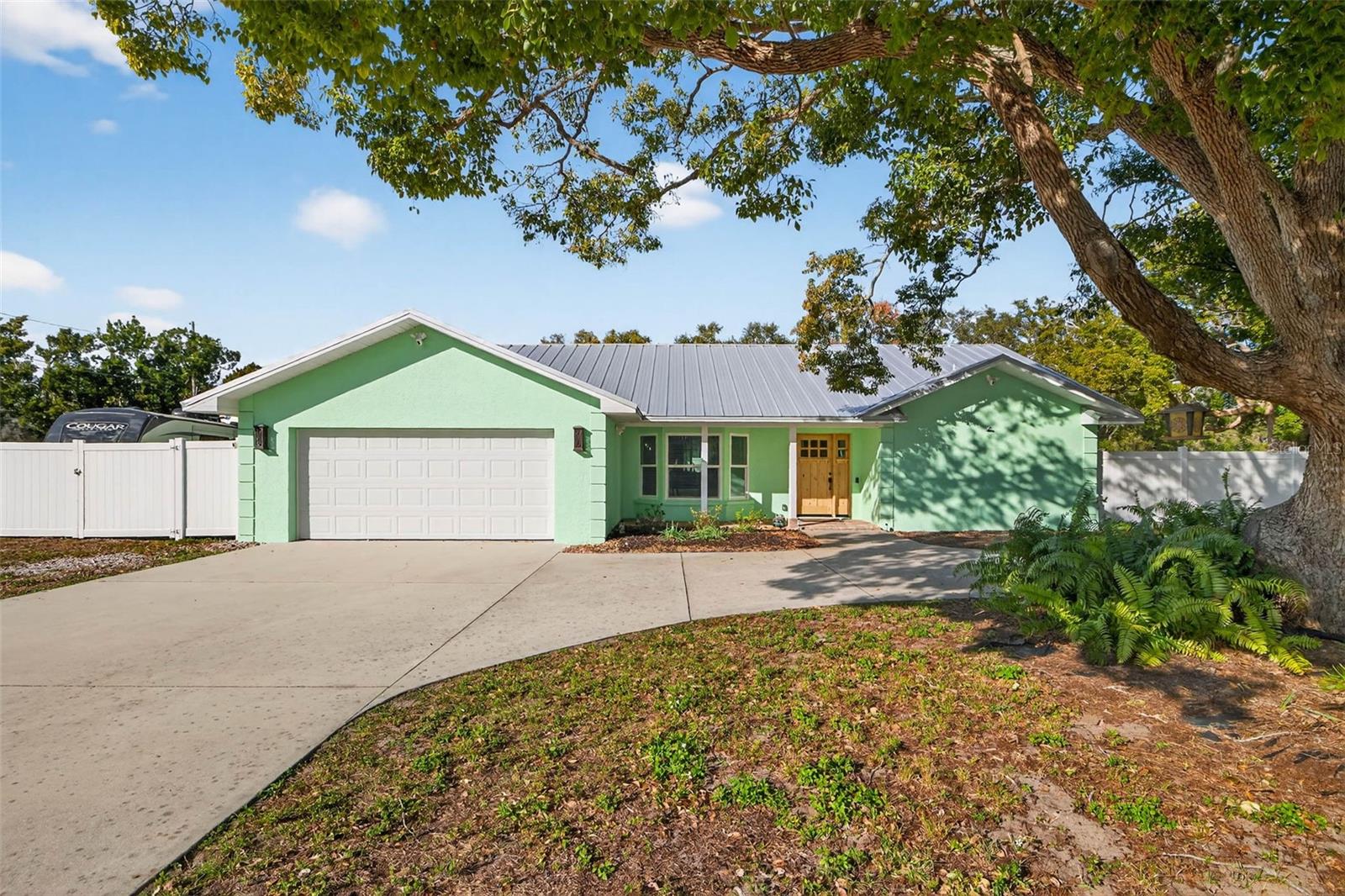 NEW PRICE!!! Come take a look at this Totally Remodeled Seminole Stunner on Nearly an Acre—Non-Flood Zone! Welcome to the unicorn you’ve been waiting for: a fully remodeled 3-bedroom, 2-bath home with over 3,000 square foot under roof, perfectly positioned on nearly an acre in desirable Seminole, FL—and yes, it’s in a non-flood zone. Nearly 2000 square foot of finished space, style, and location all checked. Step inside and prepare to fall in love with the chef’s kitchen designed to impress even the pickiest foodie. Featuring a custom natural gas range, custom cabinetry, panel refrigerator, double drawer refrigerator, built-in ice machine, and soaring vaulted ceilings, this kitchen is ready for dinner parties, holidays, or midnight snacks done right. The entire home has been thoughtfully updated, including two beautifully renovated bathrooms, highlighted by a custom tiled roll-in shower in the primary suite and striking hand-laid brick wall accents that bring serious character.
Major upgrades mean peace of mind: metal roof, hurricane-impact rated windows and doors, and a tankless water heater—because hot water should never be optional. Outside is your private Florida retreat. Enjoy a remodeled pool with new pavers and screened cage, perfect for year-round enjoyment. The fully enclosed vinyl-fenced backyard offers privacy, while multiple metal outbuildings and storage structures provide endless flexibility for hobbies, tools, toys, or all three.
Location? Nailed it. Just minutes from Millennium Park, Seminole City Park, and Seminole City Center Mall, less than 10 minutes to some of the highest-rated beaches in the U.S., and under 30 minutes to Tampa International Airport. Close to everything—yet tucked away enough to feel like your own private oasis.
Remodeled. Spacious. Storm-ready. Beach-close. This one doesn’t just check boxes—it redraws them.