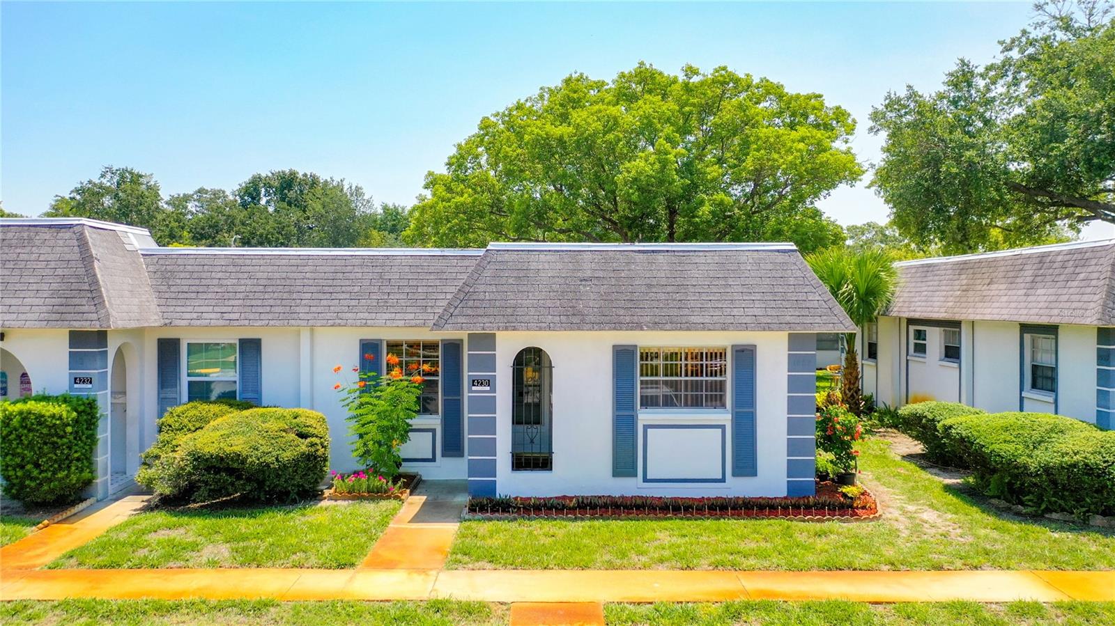 Move-in ready and thoughtfully updated, this charming condo in the desirable Gardens of Beacon Square offers comfort, convenience, & low maintenance living. This area of Gardens of Beacon Square is for all ages. Major updates include a new A/C and heating system installed in May 2024, electric water heater replaced in May 2024, water softener added in 8/2023, newer stackable washer and dryer (March 2024), and an updated electrical panel.  The kitchen has stainless steel appliances and new waterproof vinyl flooring, crown molding in living room/ dining room area, new vinyl flooring in both bathrooms. In the Florida room/ Lanai, there is a laundry area, water heater and water softener and a new 2024 window unit for the Lanai/ Florida room area. HOA is redoing the roofs right now (pictures do not reflect the new roof, pictures were done before the roof was started)) and should will be ready for final inspections soon. Enjoy easy Florida living with a functional layout, low-maintenance lifestyle, and convenient access to shopping, dining, beaches, medical, parks, 8 minutes to Tarpon Springs, 15 minutes to Palm Harbor, and 20 minutes to Clearwater, ideal location without a huge price tag. Ideal as a full-time residence, seasonal getaway, or investment opportunity! Condo/Hoa fee includes Cable TV, internet, community pool, escrow reserves fund, insurance on the building (not inside contents), maintenance exterior, Maintenance grounds, pest control, pool maintenance, sewer, water, & trash.