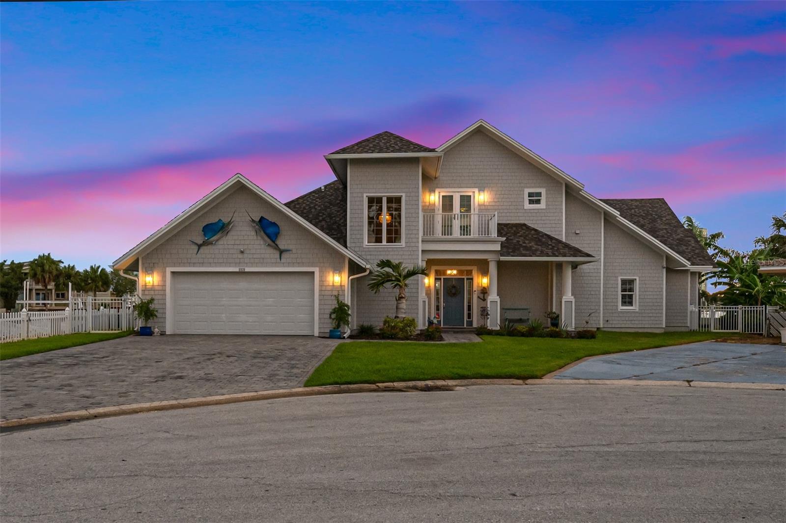 MASTERPIECE- LUXURY WATERFRONT HOME. Stunning custom built waterfront home with western views for you to enjoy daily breathtaking sunsets over Boca Ciega Bay and St Pete Beach.Completely rebuild in 2016 with incredible attention to detail. Solar panels installed in 2021. Extraordinary 150 feet of waterfront with deep sailboat water in the luxury neighborhood of Bahia Shores.Be greeted by vaulted ceilings as you enter this open floor plan elegant, well appointed one-of-a-kind beach home.Incredible chefs kitchen with top of the line appliances, custom cabinetry and huge island with lots of seating and water-views wherever you look. Privacy and Zen are words that come to mind as you enter the 900 sqft primary suite on the second floor complete with a private waterfront balcony, this is the perfect place to enjoy your morning coffee or your favorite beverage after a long day on the nearby Beach. Be wowed by the huge spa-like bathroom with double vanities and lavish stone work. This home will please your pickiest buyer, so much attention to detail everywhere you look. There is also a large bedroom suite on the main floor with a huge walk-in closet and beautiful full bath and access to the outside area. Lots of natural light pouring through the oversized door and windows and amazing views are what makes this house special. Located on 150 ft of inter-coastal waterfront in coveted St Pete Beach , just a short stroll to the sugary white sand. Large in ground pool with spa and a large composite dock with a 16,000 lbs boat lift with plenty of room for your boat and other water toys. Oversized 2 car garage with lots of storage and a convenient inside laundry room makes doing laundry a breeze. Hang out and watch a game in the newly constructed Tiki-hut (this is a must see). Lush tropical landscaping all around. This is truly your own private oasis with plenty of room to entertain family and friends. Close to unique restaurants, shopping and the famous Don Ceasar Hotel and a short drive to downtown St Petersburg. Don't miss the opportunity to make this masterpiece your Home.  Make your appointment today.