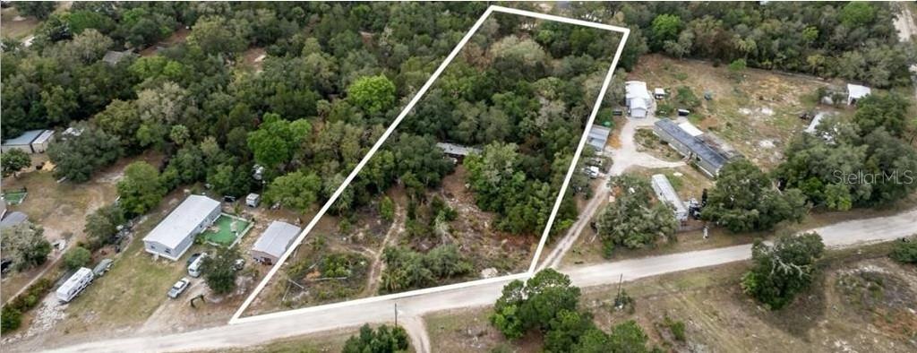 Discover the perfect canvas for your dream home or investment property on this buildable 1.54-acre lot! This high and dry terrain features partially cleared land adorned with mature trees, offering a serene setting with convenient county road frontage. Benefit from existing utilities, including a well, septic system, and previous power connection, making it an ideal spot for your new home, manufactured dwelling, or peaceful rural retreat. Situated just 5 miles from the enchanting Three Sisters Springs and Crystal River Archaeological State Park, and a mere 4 miles from Crystal River Preserve State Park, this property not only boasts convenience but also endless opportunities for outdoor adventure. Don’t miss out on this rare gem—schedule a viewing and start envisioning your future on this exceptional land! All information is provided by the seller and is believed to be accurate; however, buyers and agents should conduct their own due diligence to independently verify all details.