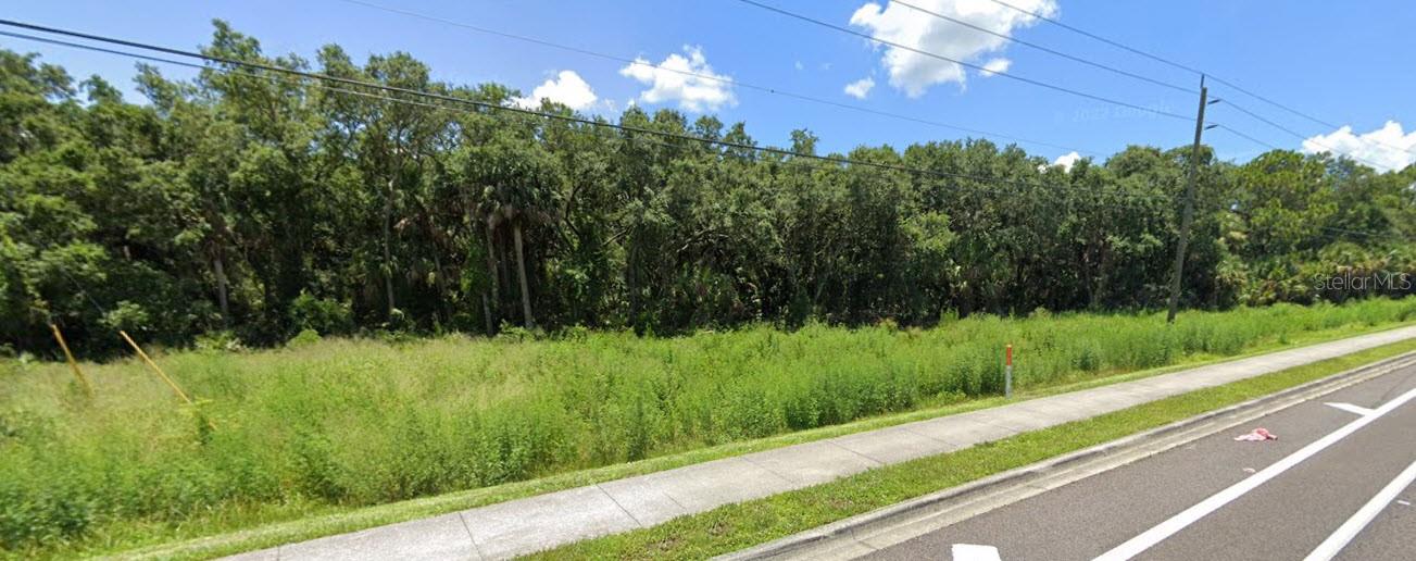 This is your chance to own an already assembled, large tract of commercial land in the Murdock area along the heavily travelled El Jobean Road. 2.3 acres with 400 feet of highway frontage and 320 feet along Cedarwood St. behind the site. This location is one of the hottest areas in the market and surrounded by some of Charlotte County's largest development projects.