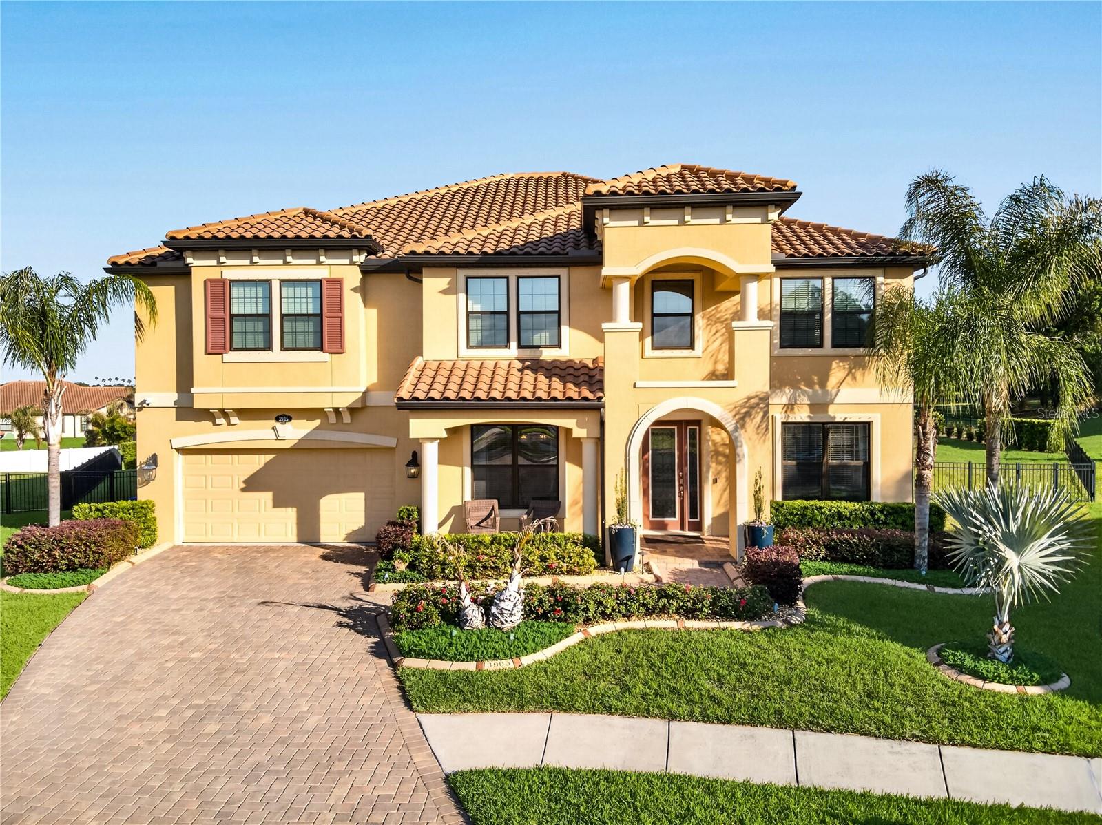 Welcome to luxury living in the highly sought-after gated community of Terra Largo, perfectly positioned in the heart of Lakeland. Nestled on a quiet cul-de-sac, this expansive 5-bedroom, 4.5-bathroom pool home offers nearly 4,900 square feet of thoughtfully designed space, ideal for growing or multi-generational families who value comfort, functionality, and style.

From the moment you step inside, you’re greeted by elegant engineered hardwood flooring and an open, inviting layout designed for both everyday living and entertaining. The gourmet kitchen is a standout feature, complete with quartz countertops, stainless steel appliances, and a separate prep area, perfect for hosting and creating memorable meals.

The home features a true owner’s retreat with dual walk-in closets and a spacious ensuite bath, offering a private sanctuary to unwind. In addition, two secondary bedrooms include their own ensuite, one conveniently located on the first floor and another upstairs, providing flexibility and privacy for guests or extended family.

Upstairs, enjoy a generous loft and dedicated media room, creating the ultimate space for movie nights, game days, or relaxation. Step outside to your private backyard oasis featuring a screened, covered lanai, resort-style pool, and an oversized yard, perfect for outdoor living year-round.

Additional highlights include a 3-car tandem garage, storm shutters, water softener system, smart switches, pool heater, and electric-vehicle charger.

This home truly offers the space, upgrades, and lifestyle today’s buyers are looking for, all within one of Lakeland’s most desirable communities.