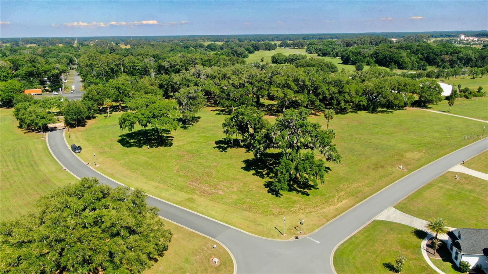 Rare opportunity to own one of the larger homesites in the gated community, located in the heart of Ocala — the Horse Capital of the World®. This beautiful 3-acre corner lot stands out with majestic mature oak trees that provide natural shade, privacy, and a truly picturesque setting rarely found within the community.

With approximately 226 feet of frontage and 580 feet of depth, this oversized parcel offers exceptional flexibility to design and build a custom estate, guest house, detached garage, pool, or expansive outdoor living space. The corner positioning provides added privacy with only one bordering neighbor.

Located near the residents-only entrance for convenient access while maintaining the peaceful atmosphere and upscale character of the land. The community features estate-sized homesites, underground utilities, private roads, and beautifully maintained surroundings designed to preserve the natural beauty of the area.

Equine-friendly community subject to HOA guidelines and restrictions, making this property an exceptional opportunity to enjoy the Ocala horse-country lifestyle while building your dream home or private retreat. Whether for personal use or long-term investment, this property offers a rare combination of space, privacy, mature landscaping, and premium community living.