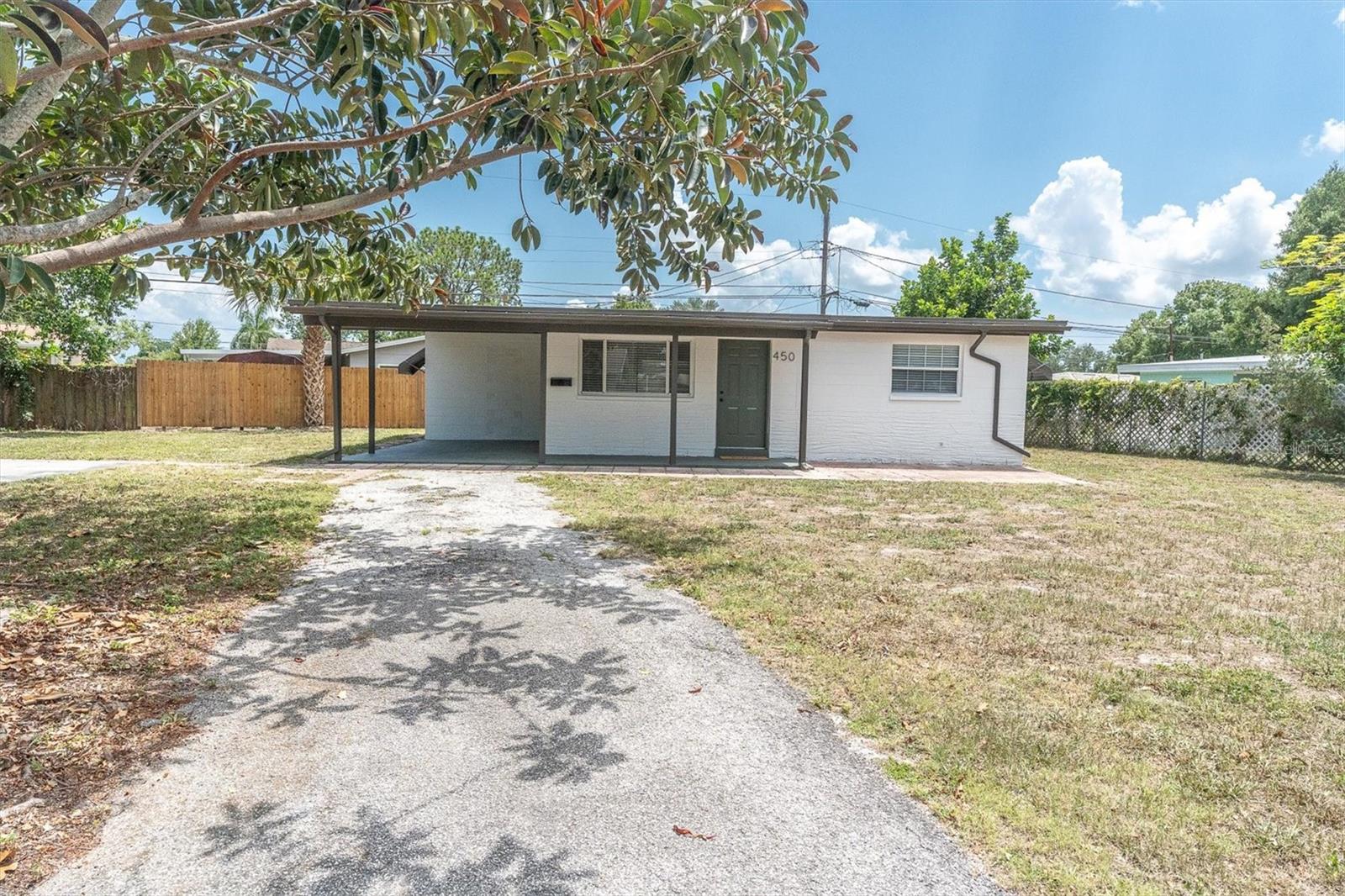 Just Listed in Edgemoor Estates!
Fresh, bright, and move-in ready, this block construction 2-bedroom, 1-bath home sits on an oversized lot in one of Northeast St. Petersburg's most convenient locations. Recent updates include fresh interior and exterior paint, new luxury vinyl flooring, stylish new light fixtures, and vaulted ceilings that create an open, airy feel throughout the home.
The functional floor plan features an interior laundry room, covered carport, and comfortable living spaces designed for easy everyday living. Outside, the expansive .24-acre lot offers endless possibilities for gardening, entertaining, pets, play, or future expansion.
A major bonus: the home did not experience any interior water intrusion during the recent hurricanes. The generous lot size also creates exciting opportunities for the future. Buyers should verify with the City of St. Petersburg, but the property may offer the potential to add an accessory dwelling unit (ADU), or possibly build a new primary residence while utilizing the existing home as an ADU—opening the door to multigenerational living, rental income, or redevelopment possibilities.
Located just minutes from Roberts Recreation Center, downtown St. Petersburg, waterfront parks, shopping, dining, and easy interstate access, you'll enjoy the perfect balance of neighborhood charm and city convenience. Whether you're looking for a move-in-ready home, an investment opportunity, or a property with room to grow, this Edgemoor Estates property offers exceptional flexibility and potential.