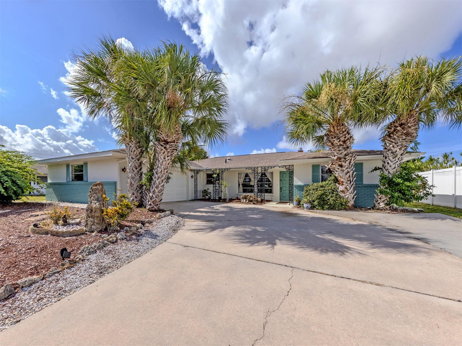 Move-In Ready Lakefront Pool Home – No Flood Insurance Required! This beautifully maintained 3-bedroom, 2-bath home is truly better than new
and offers stunning, expansive views of Long Lake. Enjoy peaceful mornings watching birds, ducks, and fish from your private backyard oasis
featuring a sparkling heated pool and updated pool cage. The home has been extensively updated, providing peace of mind for years to come.
Major improvements include complete PVC replumbing (2021), air conditioner (2022), water heater (2022), and 22 leased solar panels (2023). A
4-point inspection and wind mitigation certification were completed in 2024. The kitchen features newer appliances including refrigerator, range,
microwave, dishwasher, and washer (2023), plus dryer and disposal (2024). The spacious primary suite has been beautifully renovated in 2026
with new luxury vinyl flooring and a stunning bathroom featuring a marble-top vanity, marble walls, marble mosaic flooring, full-size wall mirror,
vanity cabinets, wood pocket door, walk-in shower, and safety bars. The guest bathroom has also been updated with new vanity and safety
features. Additional highlights include: Heated 6-foot-deep swimming pool with electric heater (2024). Premium Miami-Dade approved insulated
garage door (2024). Updated sprinkler system and timer (2024). New vinyl fencing (2024). Pool cage with tie-downs (2024). Fresh interior paint
throughout (2026). Exterior walls, shutters, soffits, and entry door freshly painted (2026). Pressure-washed and refreshed driveway and pool
deck (2026). Wood-burning fireplace. Blown-in attic insulation. Full attic storage area. Oversized 2-car garage with workbench and storage.
Updated electrical switches and receptacles. Smart thermostat system. Venice Gardens has an optional HOA that provides access to the club house and a swimming pool. With no flood insurance required, a long list of upgrades, breathtaking lake views, and true move-in-ready condition, this exceptional property is ready for its next owner to enjoy Florida living at its finest. Schedule
your private showing today!