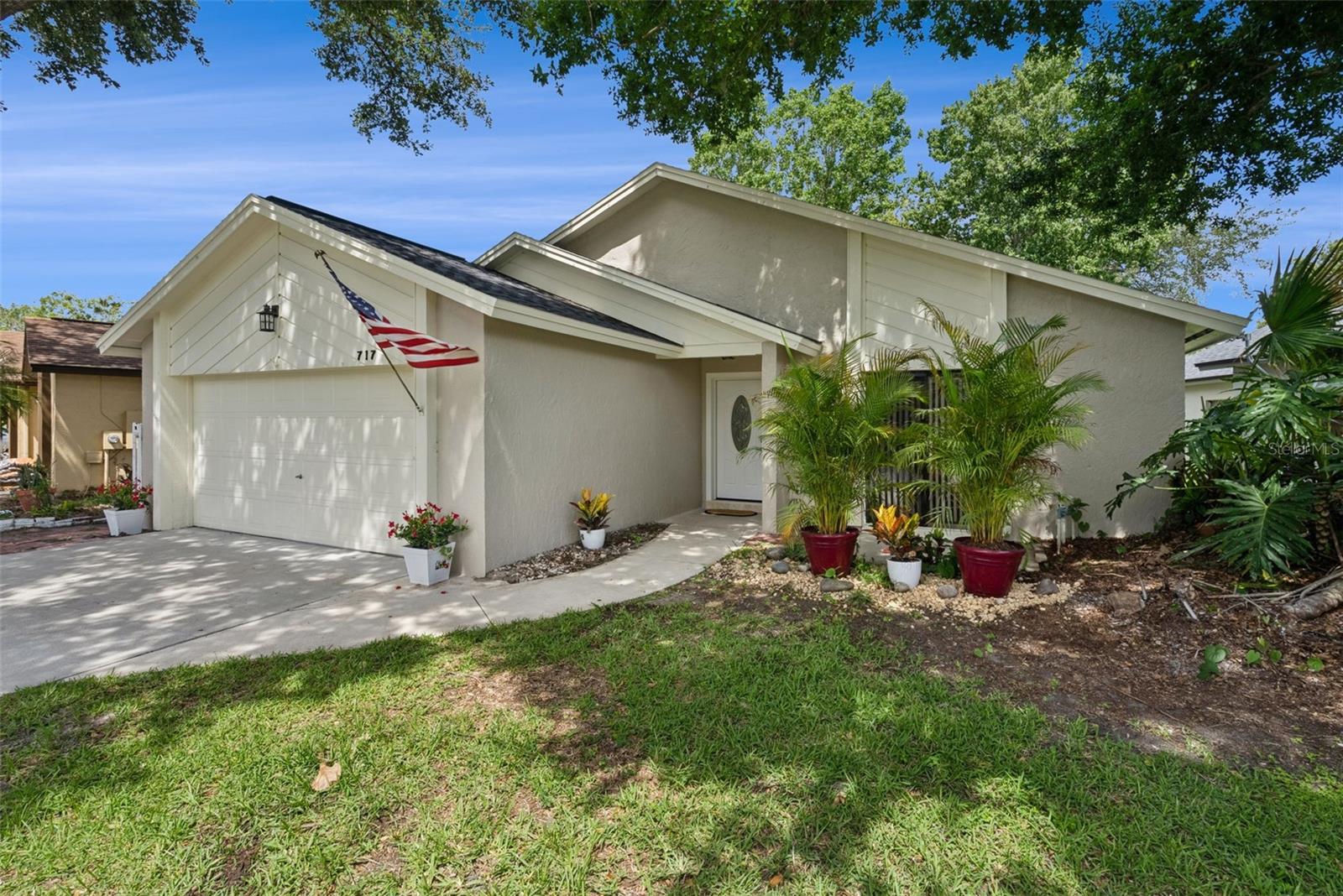 Virtually Staged. Welcome home to this absolutely charming and move-in-ready 2-bedroom, 2-bathroom home nestled in one of the most desirable areas of Winter Springs! From the moment you arrive, you'll appreciate the countless updates, beautiful wood beams and inviting curb appeal that make this home truly special. Major improvements provide peace of mind, including a 4-year-old roof, brand-new water heater, new flooring throughout, fresh interior and exterior paint, new appliances, and all-new light fixtures and ceiling fans. The beautifully updated kitchen offers modern style and functionality, while both bathrooms have been thoughtfully remodeled with today's buyer in mind. The spacious and light-filled bonus room overlooks the picturesque backyard and tranquil pond, creating the perfect space for a home office, reading room, playroom, or additional living area. Step outside and enjoy your backyard retreat featuring stunning water views and majestic oak trees that provide natural shade and beauty year-round while enjoying your morning coffee and watching the family of ducks swim by daily to greet you. Located in a great walking neighborhood, you'll love being just minutes from Tuscawilla Country Club and its renowned golf course, with olympic size pool and dining. Near top-rated schools and parks. Conveniently close to everything you need such as shopping, restaurants, medical facilities and your only a short drive to Florida's famous Theme Parks and about a 45 min drive to the best Beaches around. This adorable home offers the perfect blend of comfort, style, and location. Completely move-in ready and waiting for its new owners to fall in love—don't miss this incredible opportunity to own a piece of Winter Springs paradise!