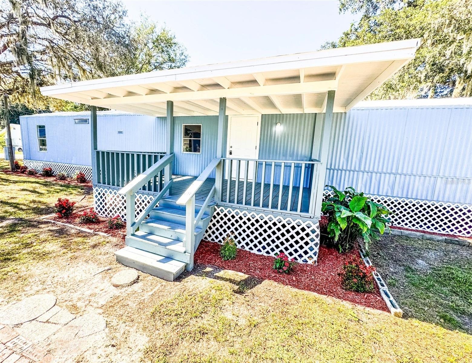 Price Improvement!! Welcome home to this newly updated 3-bedroom, 2-bath manufactured home offering comfortable living and modern touches throughout. Inside, you’ll find new luxury vinyl flooring, freshly painted interiors, and indoor laundry conveniently located off the primary bedroom. Both bathrooms have been nicely updated. Newly upgraded kitchen featuring new cabinets, appliances, sink and new light fixtures, this home is move-in ready. The bright, open-concept living area is perfect for everyday living, and the desirable split floor plan provides privacy and space for the whole family. Step outside and enjoy a covered front porch that’s perfect for morning coffee or evening relaxation. The home sits on an easy-to-maintain lot with a shed for your storage needs. Located in Polk City, you’ll enjoy the charm of small-town Florida living while being conveniently close to all the city amenities you could ever need. Easy access to the Four Corners area and just off I-4, you’ll have effortless access to Tampa and Orlando, along with iconic destinations like Disney and Busch Gardens! Ideal for a first-time homeowner or retiree looking for an affordable, charming, move-in-ready home. Why rent when you can own your own home! Best of all no HOA to limit your freedom!