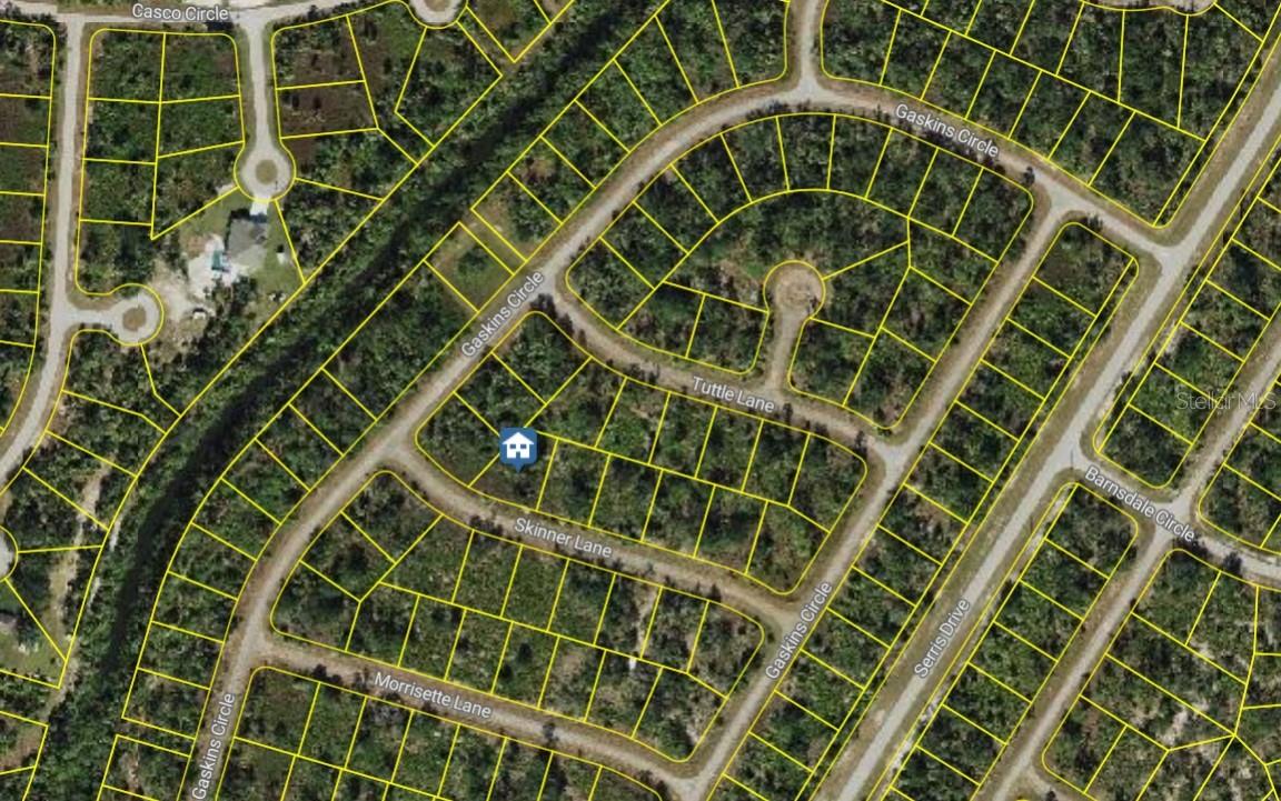This is a rare chance to own a newly AC-10 rezoned quarter-acre vacant lot in North Port—one of Florida’s top growth cities. Situated in southeast Sarasota County, the property is perfect for investors, entrepreneurs, and planners interested in the diverse possibilities of mixed-use zoning, covering industrial, medical/dental, commercial, activity centers, and multifamily residential uses. The designation encourages high-intensity development while preserving a rural atmosphere. With new I-75 interchanges planned for the area, it offers excellent connectivity for businesses or homeowners traveling north to Tampa and Orlando or south to Naples and Fort Myers. Enjoy convenient access to beautiful southwest beaches, spring training facilities for the Atlanta Braves and Tampa Bay Rays, Historic Warm Mineral Springs, the North Port Aquatic Center, bike trails, multiple golf courses, and Punta Gorda Fisherman’s Village—all less than 30 minutes away.