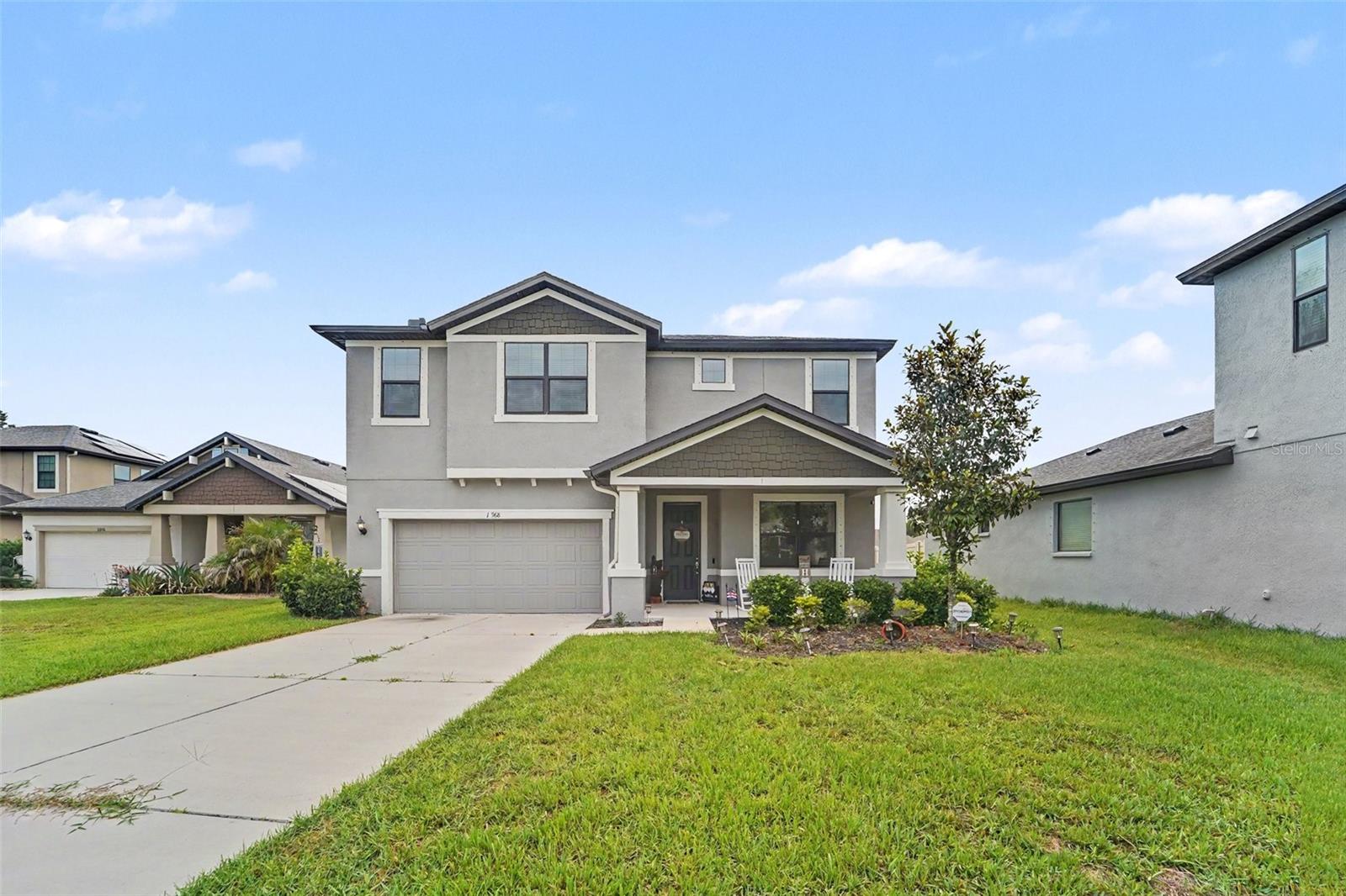 Modern elegance meets convenience in Hudson’s Lakeside community! This 2021-built two-story residence boasts 4 bedrooms, 3.5 baths, and a 2-car garage. Highlights include a functional open floor plan, soaring ceilings, a downstairs primary retreat, and premium finishes throughout. The fenced backyard sits on a peaceful cul-de-sac lot. Low monthly HOA includes access to a resort pool, fitness center, pickleball, and playground. Just minutes from major routes for an easy commute!