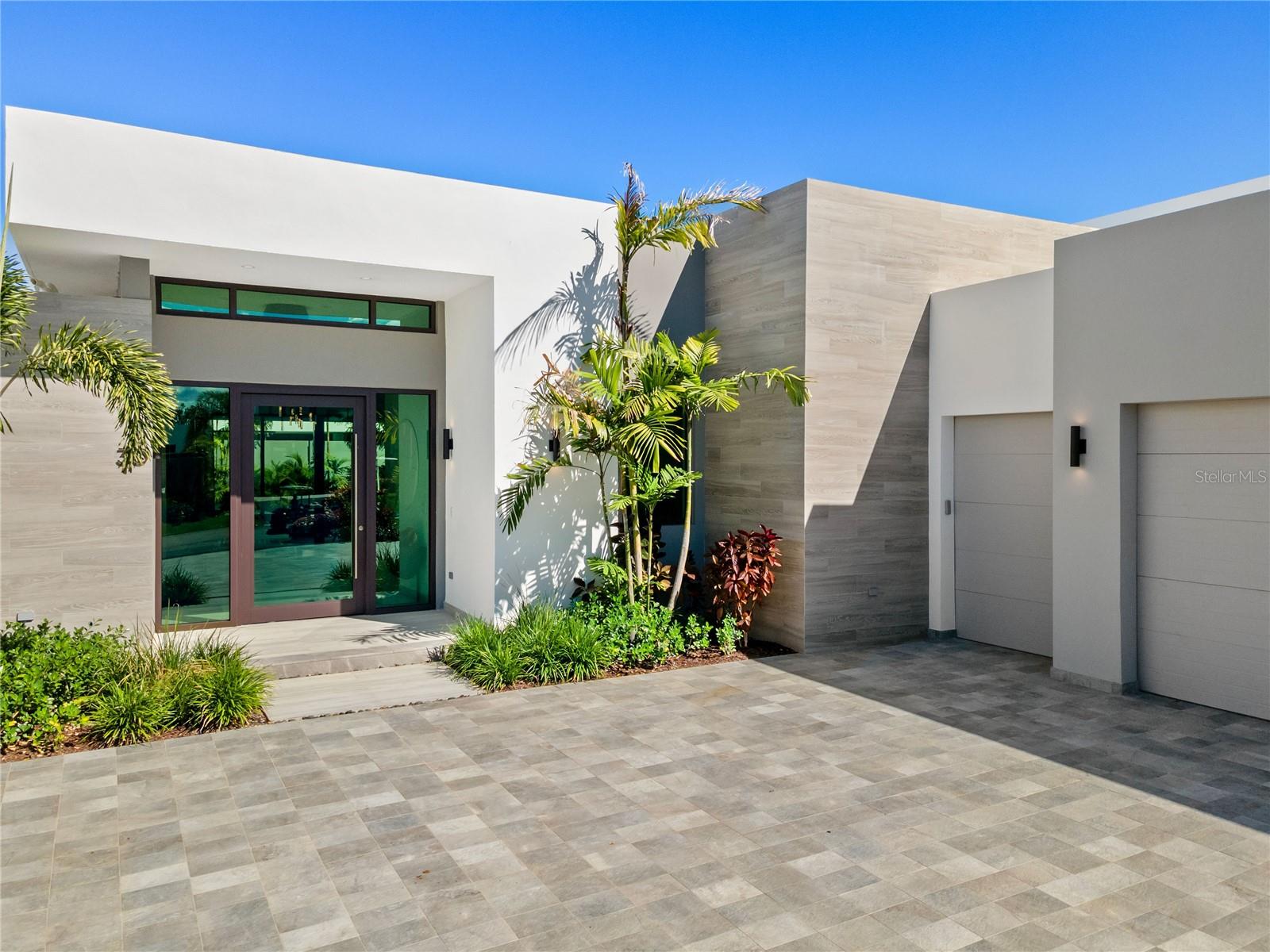 Step into your brand-new haven in the Isles community at Dorado Beach. This single-story marvel boasts 4 bedrooms, 3.5 bathrooms, and a sprawling 2,550 total square feet of luxurious living space.

As you enter, high ceilings and an open-concept floor plan greet you, flooded with natural light. Revel in the seamless integration of the living, dining, and kitchen areas with the enticing outdoor space.

The state-of-the-art kitchen, equipped with Thermidor appliances, is a culinary dream. Venture outside to discover a resort-like oasis, surrounded by lush landscaping and an exceptional outdoor terrace featuring a fully-equipped kitchen—ideal for entertaining. Whether it's a refreshing swim in the pool or relishing the tranquil ambiance of your new home, luxury abounds.

This property is offered turnkey, ensuring a smooth transition, and has been adorned by an interior decorator for a touch of sophistication. With a 2-car garage and an additional golf cart garage, ample space is provided for your vehicles and recreational gear. Safety is paramount in this gated community with 24-hour security.

The Isles community offers an array of premium club amenities, including beach access, TPC golf courses, and outstanding restaurants—all conveniently at your fingertips. Embrace a life of luxury and leisure in this unparalleled residence, where every detail has been thoughtfully curated for your comfort and style.