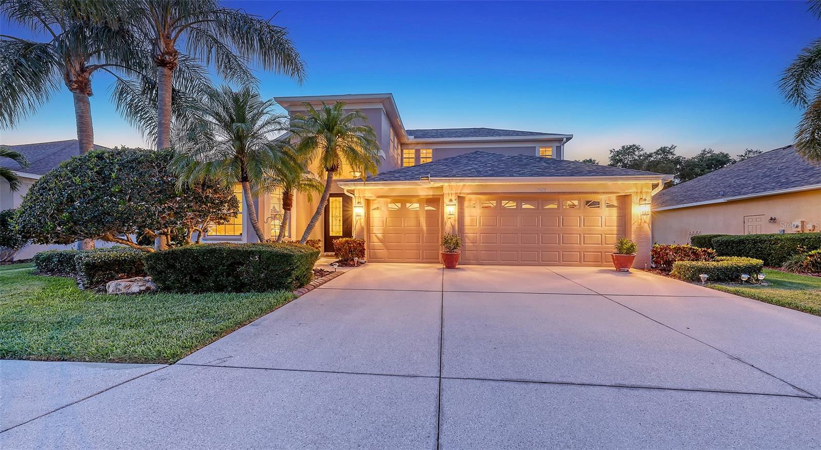 Welcome to this stunning, impeccably maintained two-story single-family home that has the potential to create a 4th bedroom (12’ x 13’9”) with a full bathroom in lieu of the large flex room upstairs. It offers luxury living in a serene, resort-style setting. Nestled on a private, oversized homesite with breathtaking views of the Tatum Ridge Golf Course and framed by majestic oak trees, this residence exudes tranquility and elegance at every turn. From the moment you arrive, you’re greeted by a grand entryway with soaring ceilings that set the tone for the spacious and open layout. The formal living and dining areas seamlessly flow into a large family room and gourmet kitchen, making this home ideal for entertaining guests or enjoying quiet family moments. The first-floor primary suite is a true retreat, boasting two generous walk-in closets and a luxurious en-suite bath. Upstairs, you’ll find two additional bedrooms, including a guest suite with a private bath and a third bedroom with a Jack-and-Jill bath connecting to a versatile large flex room with a wet bar and loft area—perfect for an additional 4th bedroom, game room or home theater. Key features and upgrades include: 3-car garage, Newer roof (2020), Newer Carrier 16 SEER A/C 2 units (2019), Whole-home water softener and filtration system (2021), Upgraded stainless steel appliances including double ovens, refrigerator, microwave, and dishwasher (2021), Saltwater sports pool and spa (14’ x 28’) with volleyball net, basketball hoop, and newer heater (2021), Screened pool enclosure with titanium screws (2018), Luxon exterior paint by Sherwin-Williams (2022), High-end Benjamin Moore interior paint (2022), Reinforced upstairs flooring with sound insulation, Bose surround sound system in family room, Reverse osmosis water system for kitchen sink and refrigerator. Step outside to your private backyard paradise, complete with a paver walkway leading to a charming pergola, ideal for sipping morning coffee or enjoying an evening glass of wine. The wrought-iron and wood railing staircase, crown molding, and custom touches throughout make this home a rare find. Located in a gated community known for its oversized lots, natural preserves, and scenic lakes, this home combines luxurious living with the peace and privacy of nature. Don’t miss the opportunity to experience this exceptional property for yourself.