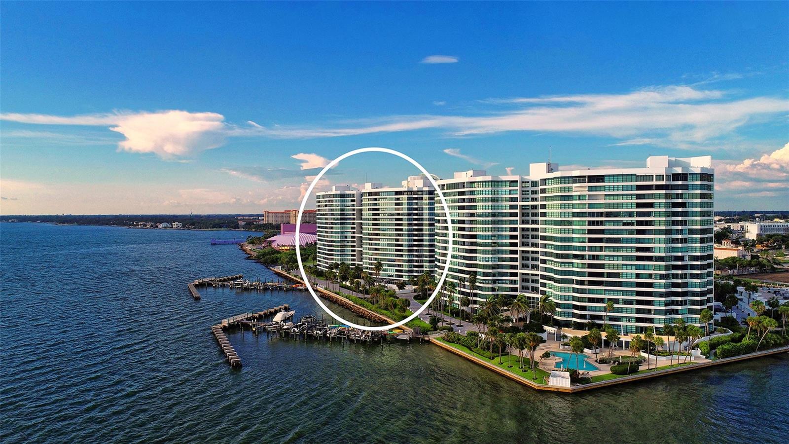 Perfectly positioned and chosen by the developer as the original model location. This is an amazing opportunity to be part of the lifestyle of Condominium on the bay. A 9 acre gated peninsula with 24 hour security.  Direct unobstructed, gorgeous year round Bay and Sunset views. No future building to obstruct the forever views. Community offers two heated pools, tennis, Pickleball, fitness, fishing pier, boat docks, and kayak storage. A pet friendly building. You can have it all in this central location, convenient to downtown Sarasota arts, restaurants, and beaches.