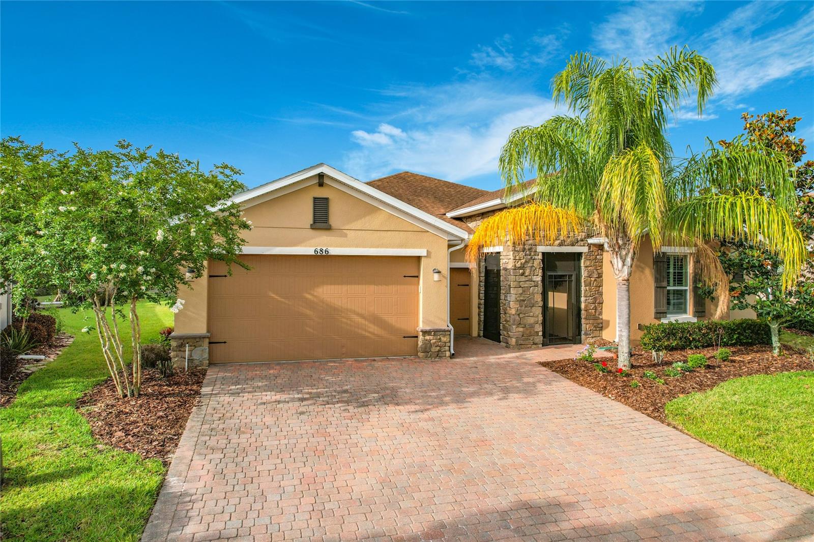 WELCOME to this Siena Model with 3 BEDROOMS, 2.5 BATHROOMS, plus a DEN/STUDY located in the Alta Vista subdivision in Solivita. This home offers two views, both CONSERVATION AND POND VIEWS. No need to bring your furniture as this home is being sold as a TURNKEY. Extended and screened LANAI (26'X 14'), 8' DOORS and DOUBLE PANE WINDOWS throughout, Architectural Stone accents at the front of the house, 18"X 18" TILE in all main living areas with CARPET in the bedrooms and den/study, PLANTATION SHUTTERS  throughout, and SURROUND SOUND. The front screened porch leads to the STAINED GLASS front door. The KITCHEN features STAINLESS STEEL APPLIANCES, pull outs, SOFT CLOSE drawers, GRANITE COUNTERS, an ISLAND, walnut wood cabinetry, a PANTRY, and a Wine Refrigerator. The LAUNDRY ROOM has a sink, and a WASHER and Dryer. The GREAT ROOM is a wonderful place to relax and entertain guests. The Owner's SUITE has a Tray Ceiling, two walk-in CLOSETS, and an AMAZING VIEW!! With an OPEN FLOOR PLAN, the other two bedrooms are on the other side of side of the home. Your guests will have total PRIVACY. The GARAGE is a two-car garage,EXTENDED four feet plus a golf cart garage. Three sliders in the GREAT ROOM will lead you into the HUGE LANAI. An awesome place to relax, cook out on the grill, and enjoy your two views. MAKE THIS HOME YOURS TODAY.Solivita is an active 55+ community located near Kissimmee, Florida. Solivita amenities include a manicured SOFTBALL diamond and field, 36 holes of CHAMPIONSHIP GOLF, 2 STATE OF THE ART amenity centers with updated exercise equipment, 3 RESTAURANTS, 14 HEATED POOLS, 17 PICKLEBALL COURTS, 9 TENNIS COURTS,4 BOCCE BALL COURTS, HORSESHOE PITS, over 300 resident CLUBS, miles of bike paths, Tot Lot PLAYGROUND, COMMUNITY GARDEN, and much more. The HOA maintains the LANDSCAPING & IRRIGATION system at all homes, PROVIDES SECURITY at all gates, and mobile patrols with the POLK COUNTY SHERIFF'S OFFICE. POINCIANA LAKES PLAZA is a major NEW shopping center directly across the main gate of Solivita. It features Sprouts, TJ Maxx, Ross, Rack Room Shoes, 5 Below, Outback, First Watch, and more!!
