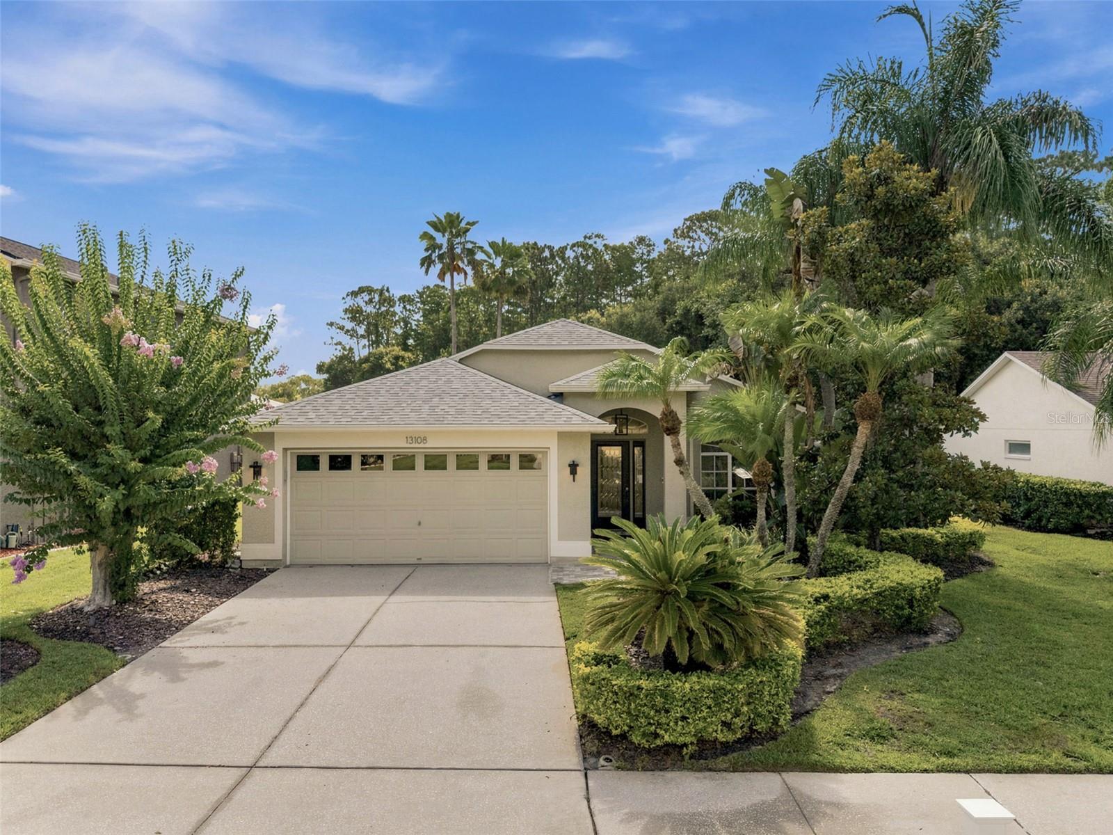 Set on a beautiful conservation pond lot in The Eagles gated community offering the perfect blend of nature, serenity and amenity with access to A rated schools. 
On arrival, take in the curb appeal achieved through thoughtful design, meticulous maintenance and tropical landscaping. Step inside through the beveled glass entryway to this beautifully updated 3 bedroom/3-bathroom pool home featuring a bonus office/den. You will immediately notice the vaulted ceilings and the hardwood floors throughout.  The beautifully updated kitchen is open to the dining room and family room  and features a breakfast bar island. The kitchen features stainless steel appliances and attractive soft close shaker cabinets with crown moldings, quartz countertops, a glass subway tile backsplash and an architecturally pleasing and functional exhaust hood. 
The bedrooms are in a split plan and feature the same hardwood flooring seamlessly connecting to the living spaces.  The primary suite offers the perfect retreat featuring a luxurious bathroom with dual vanity, jetted tub, tempered glass shower enclosure and a walk-in closet. The other two bedrooms boast vaulted ceilings and are in their own hallway adjacent to the guest bathroom.
This home features an idyllic private sun-drenched tropical pool oasis overlooking the pond and woods beyond.  The pebble tec pool and heated spill over spa are surrounded by a paver pool deck, screen enclosure and tropical landscaping.  It’s the perfect place to relax and wind down! 
With over 1,000 acres of verdant landscapes, including two 18-hole golf courses, clubhouse, and gated entrances, The Eagles ensures a secure and serene living experience. Whether you're enjoying the community park, playing tennis, observing the abundant wildlife, or relaxing at home, life here is truly exceptional.  It is perfectly situated on the western edge of Hillsborough County offering convenient access to the airports, beaches, downtown Tampa, and Clearwater and everything Tampa Bay has to offer.  
Major updates include a roof replaced in 2021, HVAC in 2018, and water heater in 2020 offering added piece of mind.