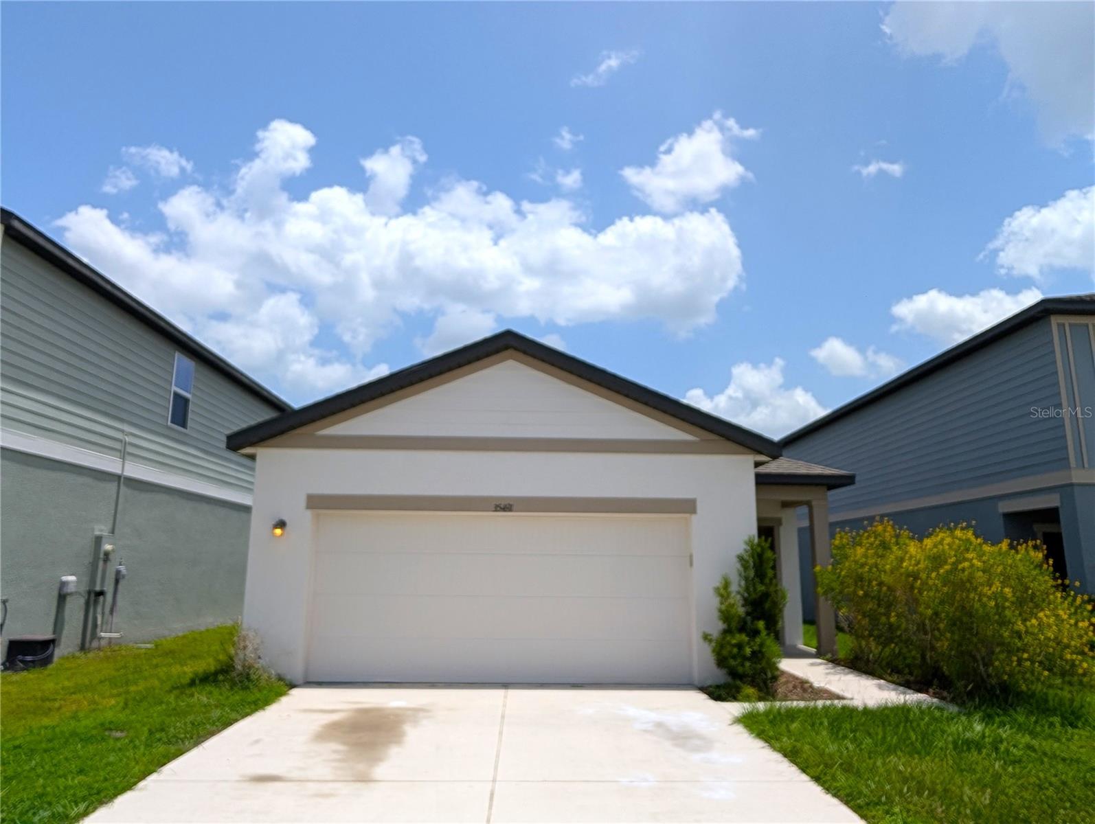 Newly listed! Welcome to this amazingly spacious 3-bedroom, 2-bathroom single-family home, ideally located in the heart of the desirable Hidden Creek community. As you step inside, you will immediately appreciate the open-concept floor plan, soaring ceilings, and abundance of natural light. The kitchen, the heart of the home, features a large center island that's perfect for meal preparation, entertaining, or showcasing your culinary skills. It also offers beautiful granite countertops, solid wood cabinetry with ample storage, and stainless steel appliances. Each bedroom is generously sized, providing comfort, privacy, and plenty of closet space for all your storage needs. Start your mornings or unwind in the evenings on your private patio while enjoying peaceful, tranquil views of the community pond. Hidden Creek offers outstanding community amenities, including a playground, dog park, and community pool, making it easy to enjoy Florida living year-round. Conveniently located near excellent restaurants, Tampa Premium Outlets, and The Shoppes at Wiregrass, this home also provides easy access to SR 54, US 301, and I-75, making commuting to Tampa and surrounding areas a breeze. Do not miss your opportunity to make this beautiful home yours. Schedule your private showing today, your perfect home awaits! We show properties seven days a week.