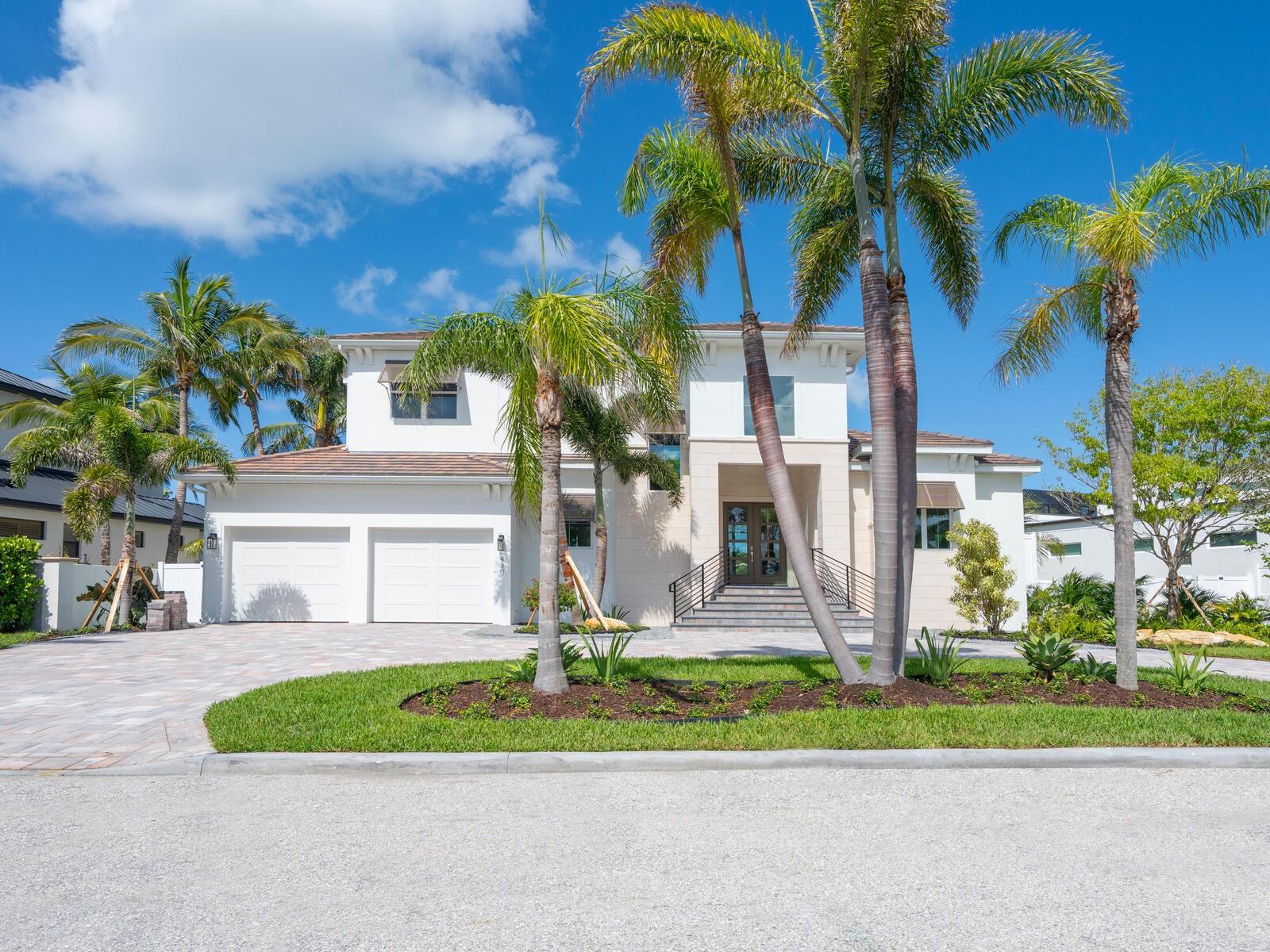 Construction now complete! Located in the high-demand waterfront community of Bird Key, this brand new elite home of luxury will impress with excellence in craftsmanship and eye-catching amenities at every turn. The award-winning team at Allegra Homes introduces the handsome two story 3,461 sq. ft. “Sorrento” that exudes sophistication from concept to creation. A significant ambiance of beauty and charm invites exploration through an enticing foyer entry that opens to stunning interiors and amazing architectural details enhanced by natural light throughout. There are a variety of interesting nuances sure to please in this 4-bedroom, 4.5 bath home with bonus and media rooms. The magnificent great room features a 22-ft. beamed recessed ceiling and entertainment wall, and is open to a dining room with built-in buffet and wine fridge and an outstanding island kitchen with premium appliances and all the culinary items needed for delightful meal preparation. The covered poolside dining/living area with top-of-the-line outdoor kitchen is perfect for memory-making moments with family and friends. In addition to the outdoor living area, the pool screen encloses the heated pool and spa to create a beautiful oasis to be treasured and enjoyed. Open up one wall in the bonus room and you have additional indoor/outdoor space for entertaining. There’s an adjacent pool bath for convenience. The enormous first-floor owner’s suite is separate from the rest of the house and offers the ultimate personal retreat with double walk-in closets and a glam bath with designer style free-standing tub, frameless glass shower, dual sinks and private water closet. A lovely guest ensuite is also located on the first floor. Upstairs are 2 bedrooms, 2 baths and a generous media room. The gorgeous winding staircase is enhanced with metal railing adding a touch of refinement and artistic style. Additional features include an elevator shaft; natural gas cooktop, grill, water heater and pool heater; epoxy finished 2-car garage; professional landscaping and irrigation well; impact windows and doors; paver drive/walk and much more. Membership in the Bird Key Yacht Club offers a marina, dock rental privileges, casual and formal dining, clay tennis courts, and a deck for watching the boats traveling through New Pass. This exclusive guard-gated enclave boasts 510 homes in one of the most prestigious residential areas on Florida’s West Coast and is within minutes to Lido Key beaches, world-class St. Armands Circle, and exciting downtown scene. Live in the home of your dreams in a coveted central location where every convenience is easily within reach. Simply the best of the best!