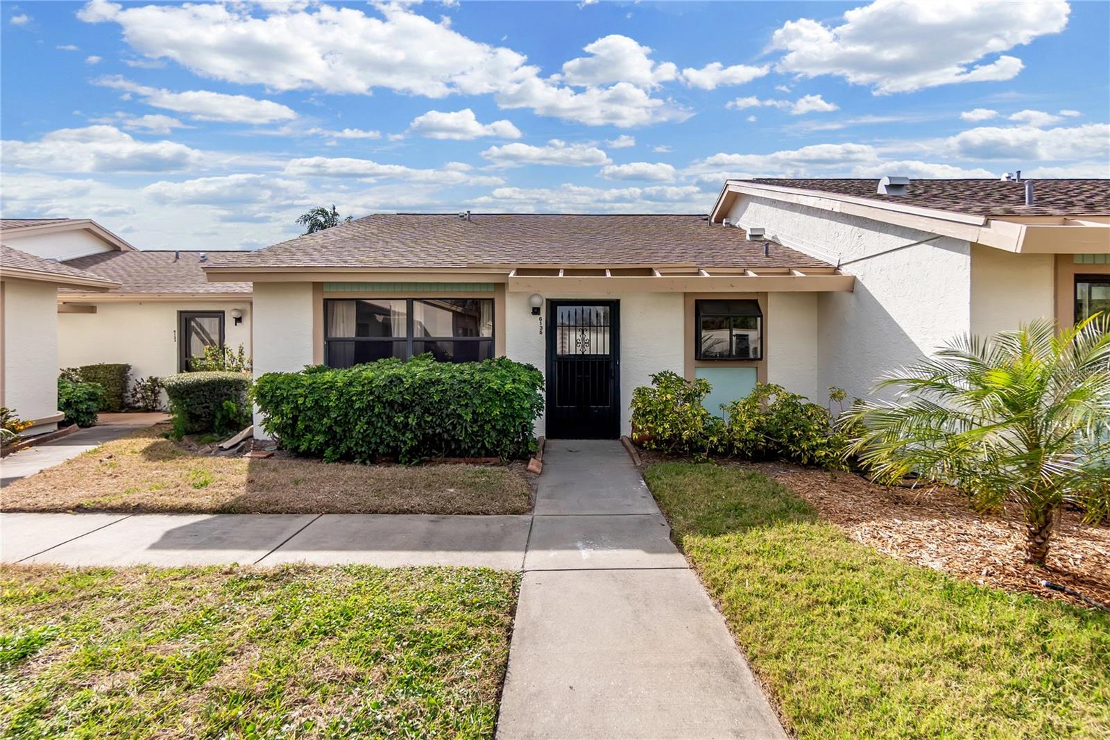 Virtually Staged. Just 5 miles from the world-famous white sand beaches of Anna Maria Island, this fully renovated, move-in-ready 2-bedroom, 2-bath condominium offers exceptional value in the highly desirable, pet-friendly MeadowCroft South 55+ community, one of the area’s best options for easy, low-maintenance Florida living.

Step inside to a bright and modern open floor plan highlighted by vaulted ceilings and a thoughtfully designed split-bedroom layout that provides both comfort and privacy. The spacious living area flows seamlessly to an oversized lanai, perfectly positioned in a quiet, low-traffic section of the community, ideal for relaxing evenings while enjoying Florida’s stunning sunset skies.

This beautifully updated home features numerous upgrades, including:

• New A/C (2025)
• Custom white shaker-style kitchen cabinetry
• Elegant quartz countertops with matching backsplash
• Premium stainless-steel appliances
• New in-unit washer/dryer combo
• Ceramic tile flooring throughout
• Fresh interior paint
• All new shaker-style interior doors, trim, and baseboards
• Whole-house tankless water heater

Both bedrooms offer generous walk-in closets, and the primary suite provides a comfortable retreat ready to enjoy while allowing you to add your own personal touches over time. A covered carport and additional storage space add everyday convenience.

Residents of MeadowCroft South enjoy a welcoming community atmosphere and a variety of amenities including a heated pool and spa, scenic lake with fountain, and a covered cabana with bathrooms, showers, and lounge areas, perfect for social gatherings and relaxing afternoons.

Just three minutes away, GT Bray Park offers tennis courts, covered pickleball courts, a full fitness center, playgrounds, and beautiful nature trails. The location also places you close to shopping, dining, golf courses, IMG Academy, Blake Medical Center, and Sarasota-Bradenton International Airport (under 10 miles).

Whether you’re searching for a seasonal getaway, full-time residence, or income-producing investment, this thoughtfully updated condo offers the perfect combination of comfort, convenience, and coastal lifestyle.