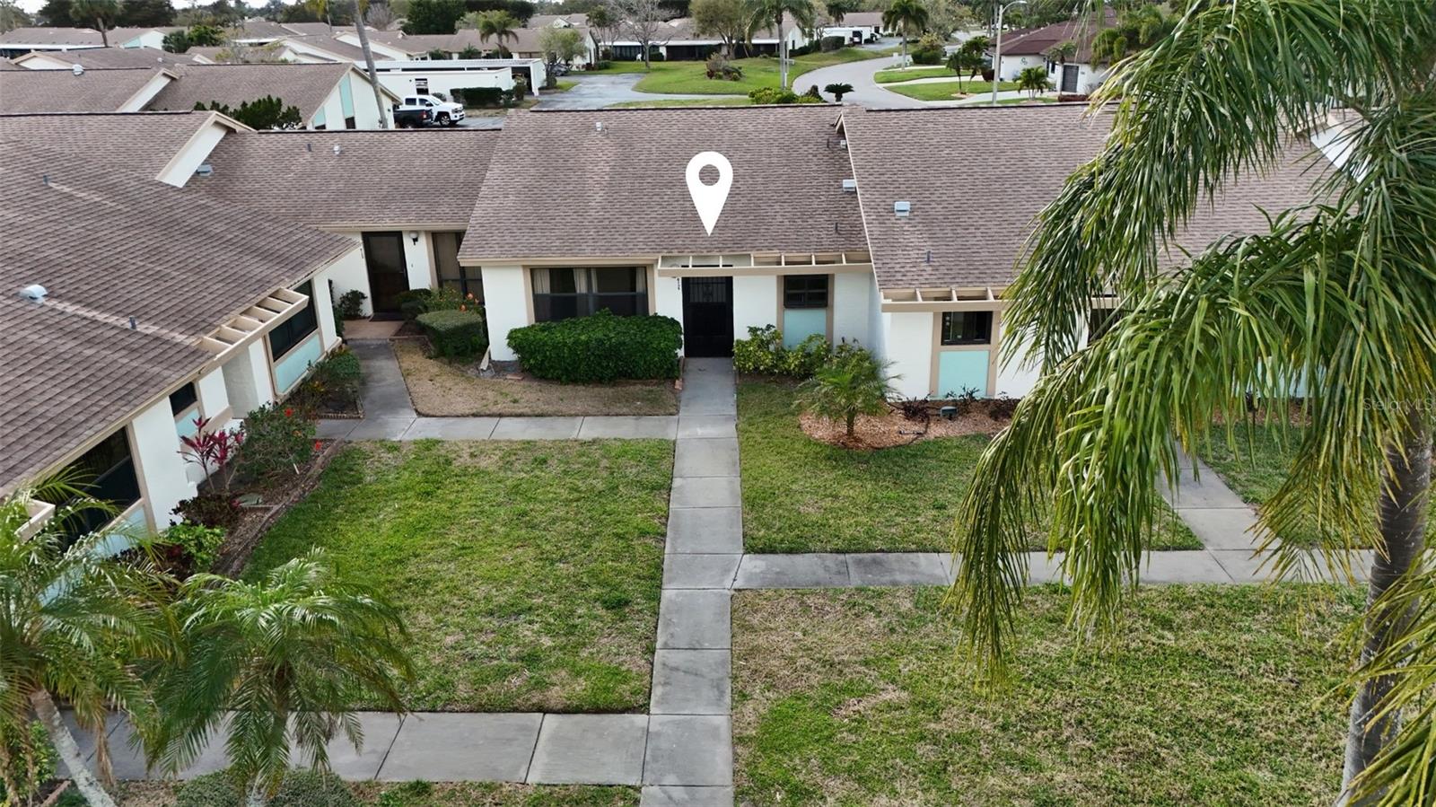 One or more photo(s) has been virtually staged. This fully renovated, move-in-ready 2-bedroom, 2-bath condominium offers exceptional value in the highly desirable, pet-friendly MeadowCroft South 55+ community, one of the area’s best options for easy, low-maintenance Florida living. Just 5 miles from the world-famous white sand beaches of Anna Maria Island,

Step inside to a bright and modern open floor plan highlighted by vaulted ceilings and a thoughtfully designed split-bedroom layout that provides both comfort and privacy. The spacious living area flows seamlessly to an oversized lanai, perfectly positioned in a quiet, low-traffic section of the community, ideal for relaxing evenings while enjoying Florida’s stunning sunset skies.

This beautifully updated home features numerous upgrades, including:

• New A/C (2025)
• Custom white shaker-style kitchen cabinetry
• Elegant quartz countertops with matching backsplash
• Premium stainless-steel appliances
• New in-unit washer/dryer combo
• Ceramic tile flooring throughout
• Fresh interior paint
• All new shaker-style interior doors, trim, and baseboards
• Whole-house tankless water heater

Both bedrooms offer generous walk-in closets, and the primary suite provides a comfortable retreat ready to enjoy while allowing you to add your own personal touches over time. A covered carport and additional storage space add everyday convenience.

Residents of MeadowCroft South enjoy a welcoming community atmosphere and a variety of amenities including a heated pool and spa, scenic lake with fountain, and a covered cabana with bathrooms, showers, and lounge areas, perfect for social gatherings and relaxing afternoons.

Just three minutes away, GT Bray Park offers tennis courts, covered pickleball courts, a full fitness center, playgrounds, and beautiful nature trails. The location also places you close to shopping, dining, golf courses, IMG Academy, Blake Medical Center, and Sarasota-Bradenton International Airport (under 10 miles).

Whether you’re searching for a seasonal getaway, full-time residence, or income-producing investment, this thoughtfully updated condo offers the perfect combination of comfort, convenience, and coastal lifestyle.