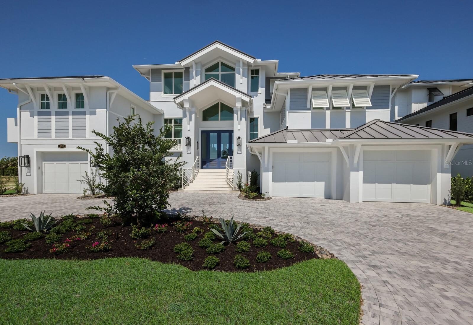 Brand New Construction*** Another Luxury Model Home at Hill Tide Estates is now complete and turnkey ready! The ‘fully furnished’ Sunny Isles Model presented by Seagate Development Group & Theory Design features a unique blend of elegance and precision craftsmanship. The multi-level floor plan offers panoramic water views of Boca Grande Pass and sunsets over the Gulf of Mexico. Theory Design’s custom décor furniture package offers convenience and instant gratification for the most selective Buyer. The second level / main floor features a spacious Master Suite with an additional VIP Suite that will be enjoyed by your special guests. Seagate's showcase custom kitchen is tastefully appointed with beautiful wood cabinetry, Thermador built in appliances, massive quartz dining island, and a cocktail cabinet with beverage cooler & ice maker. Outdoor living will be the focal point of this model as the elevated custom saltwater pool & spa is conveniently accessed off the main level. Elegant waterfalls gently spill over into main pool complemented with custom spa and sun shelves. The spacious covered lanai features remote screens, custom double sided fireplace, and an outdoor summer kitchen. The top / third level offers 2 additional bedroom ensuites, and a captivating sunset room with additional beverage & ice maker for entertaining. Hill Tide Estates or the “Jewel of Boca Grande” is majestically positioned along the shores of Boca Grande Pass. This 19-luxury home site development offers panoramic seascape unmatched anywhere else on Gasparilla Island. The gated community features a private tiered beach, and a unique private fishing / observation pier in Boca Grande Pass exclusive for the 19 homeowners.