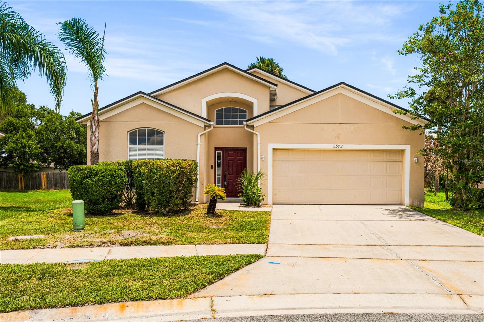 Virtually Staged. Nestled on a quiet cul-de-sac in the established community of Chase Grove, this well-maintained 3-bedroom, 2-bath home offers an exceptional opportunity to own in one of Seminole County's most desirable and affordable neighborhoods. Located within a top-rated school district Crystal Lake Elementary, Markham Woods Middle, and Seminole High School this home combines value, location, and endless potential.

Offering over 1,500 square feet of single-story living space, this solidly built home is perfect for first-time buyers, downsizers, or anyone ready to add their own personal style. Mature landscaping and an inviting front door welcome you into a dramatic 14 foot foyer highlighted by an elegant arched window.

The formal living and dining room feature neutral ceramic tile flooring, vaulted ceilings, and updated ceiling fans, creating a bright and spacious setting for entertaining. Just off the foyer is a secondary bedroom, ideal for guests, a home office, or flex space.

The light-filled family room offers multiple windows and flows seamlessly into the updated kitchen. Recently renovated, the kitchen features new white Shaker cabinetry, warm earth-tone countertops, a large prep area, stainless steel sink, and a new stainless steel appliance package. An adjoining breakfast nook provides the perfect space for casual dining and offers excellent potential for an open-concept design. 

The private primary suite features fresh carpeting, a walk-in closet, and a spacious en-suite bath complete with a Golden Oak vanity and walk-in shower.  An additional bedroom is conveniently located near the second full bathroom, providing comfortable accommodations for family or guests.

Step outside to a paver-lined open-air patio overlooking a generously sized, fully fenced backyard an ideal setting for entertaining, gardening, or simply relaxing in your own private outdoor retreat. The wooded areas surrounding the community provide a natural habitat where residents often enjoy sightings of barn owls, bald eagles, turtles, otters, and other native wildlife.

Major improvements provide added peace of mind, including a newer roof, new kitchen cabinetry, and a recently rebuilt air conditioning system.

Residents of Chase Grove enjoy community amenities that include a playground, two tennis courts, expansive green space, and sidewalks perfect for walking, jogging, and biking.

Conveniently located just minutes from the Boombah Sports Complex, Sanford Riverwalk, Centennial Park, Historic Downtown Sanford, Sun Rail, shopping, dining, and major highways.