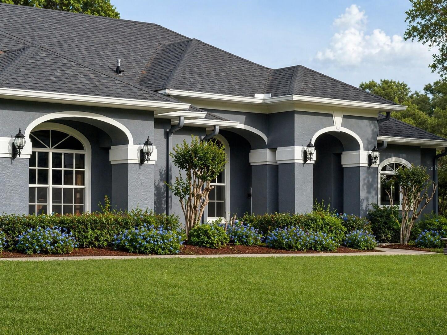 Private gated 7+ acre equestrian estate in the heart of Central Florida horse country. This beautifully maintained property has an oversized dressage arena, round pen, 8 large paddocks, and 2 barns. The 5-stall center-aisle barn features tack room, feed room, washer/dryer hookup, LED lighting, ceiling fans, and above-stall fly spray system. A separate 3-stall turnout/breeding barn adds flexibility. The 3BR/3BA residence has high ceilings, island kitchen, and a gunite pool opening to the patio for easy indoor-outdoor living. Recent improvements include fresh interior and exterior Sherwin Williams paint on the house and barns, newer roof, resurfaced pool, new well pump,  Trane HVAC, updated lighting, new barn doors, blacktop driveway, new gate motor, and beautiful fencing. A rare opportunity for the serious equestrian or buyer seeking a private estate lifestyle with convenient access to Orlando and surrounding areas.
Please note that the dressage riding arena was staged.  All it needs is footing. The drain system is there.  Some of the rooms are staged with furniture to give decorating ideas. The bathrooms are in the process of having grey cabinets and granite counter tops.