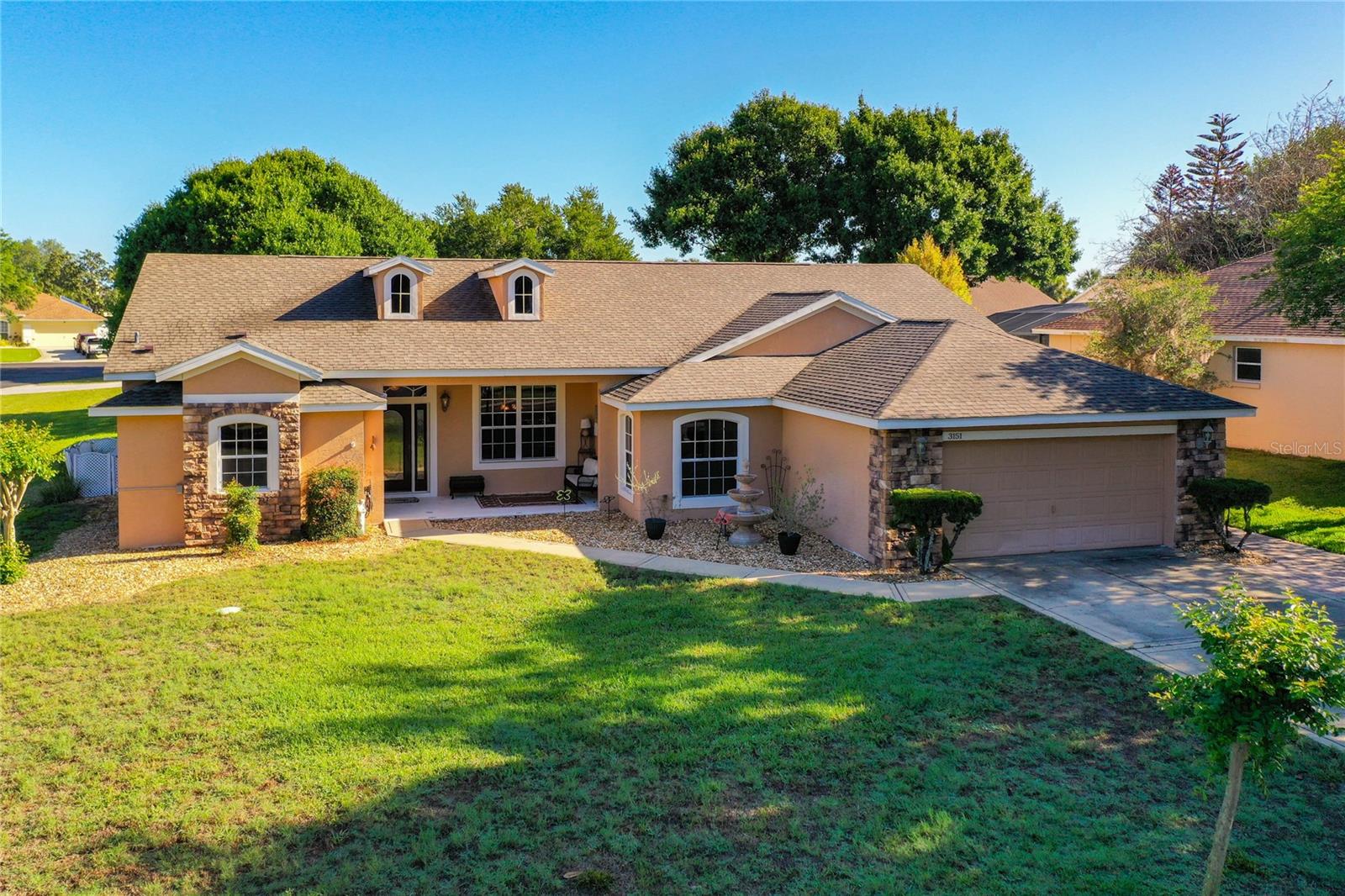Discover the perfect balance of peaceful suburban living and modern convenience at 3151 Brighton Road, Eustis, FL 32726. This beautifully designed single-family home offers a bright, open atmosphere that effortlessly accommodates both spacious gatherings and quiet, relaxing evenings. Boasting an expansive 2,300 square feet of interior living space, the residence features a versatile floor plan with high ceilings, a generous kitchen ideal for home chefs, and seamless flow throughout the main living areas.

The comfort extends outdoors to a manicured and irrigated 0.28-acre lot, providing a fantastic backyard footprint with plenty of room for outdoor entertainment, gardening, or a play area. Complete with a 2-car attached garage for ample parking and extra storage, this home delivers everything you need for the quintessential Florida lifestyle. Nestled in a peaceful, established neighborhood with Lake Eustis access, you will remain just minutes away from historic downtown Eustis, scenic local parks, local schools, and the beautiful shores of Lake Eustis. Whether you are looking for room to grow or a spacious retreat to make your own, this property is ready for its next chapter.