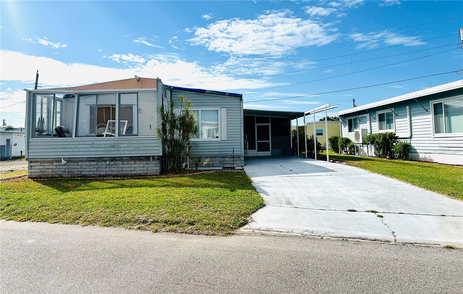 Calling all PROJECT SEEKERS and CREATIVE RENOVATORS — this one’s for you!  Located in the highly sought-after TROPIC ISLES, A 55+ resident-owned waterfront community, this hurricane-damaged mobile home is ready for your vision and craftsmanship. Perfect for those who love a challenge and see opportunity where others see work. Whether you choose to repair, replace, or rebuild, this property offers endless potential in a waterfront lifestyle setting with community amenities including marina, pool, clubhouse, and active social calendar. Sold AS-IS. Cash offers only. Come turn this blank canvas into your Florida dream retreat!