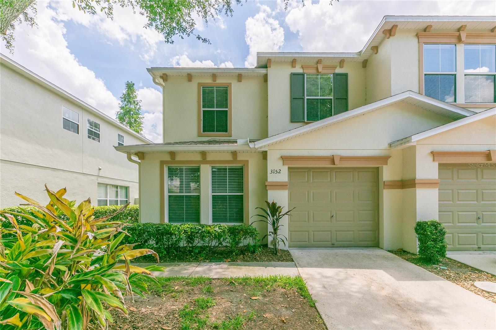 SELLER OFFERING $5,000 IN CONCESSIONS! Welcome to the community of Wedgewood in the heart of Valrico. This 2-story townhome boasts 4 bedrooms, 2.5 baths, a 1 car garage, and a thoughtfully laid out interior. Major upgrades include new roof (2025), new A/C (2025), fresh interior paint, and a new double-pane sliding glass door. The first floor features an open concept layout between the kitchen, living room and dining room, perfect for everyday living and entertaining. The kitchen has newer stainless-steel appliances, recessed lighting, a center island with breakfast bar, and a large pantry closet. Glass sliders lead out onto the covered patio, an ideal setting to relax and enjoy the peace and quiet of NO REAR NEIGHBORS!  A downstairs bedroom with nearby half bath completes the main level, providing flexibility for guests, a home office, or multi-generational living. Upstairs, the primary bedroom has a spacious walk-in closet and en suite bath with dual vanity sinks, glass enclosed shower and separate soaking tub. The remaining two secondary bedrooms share a full bathroom and the laundry room is conveniently located near all upstairs bedrooms. Wedgewood offers maintenance- free living at its finest and a community pool! No CDD!