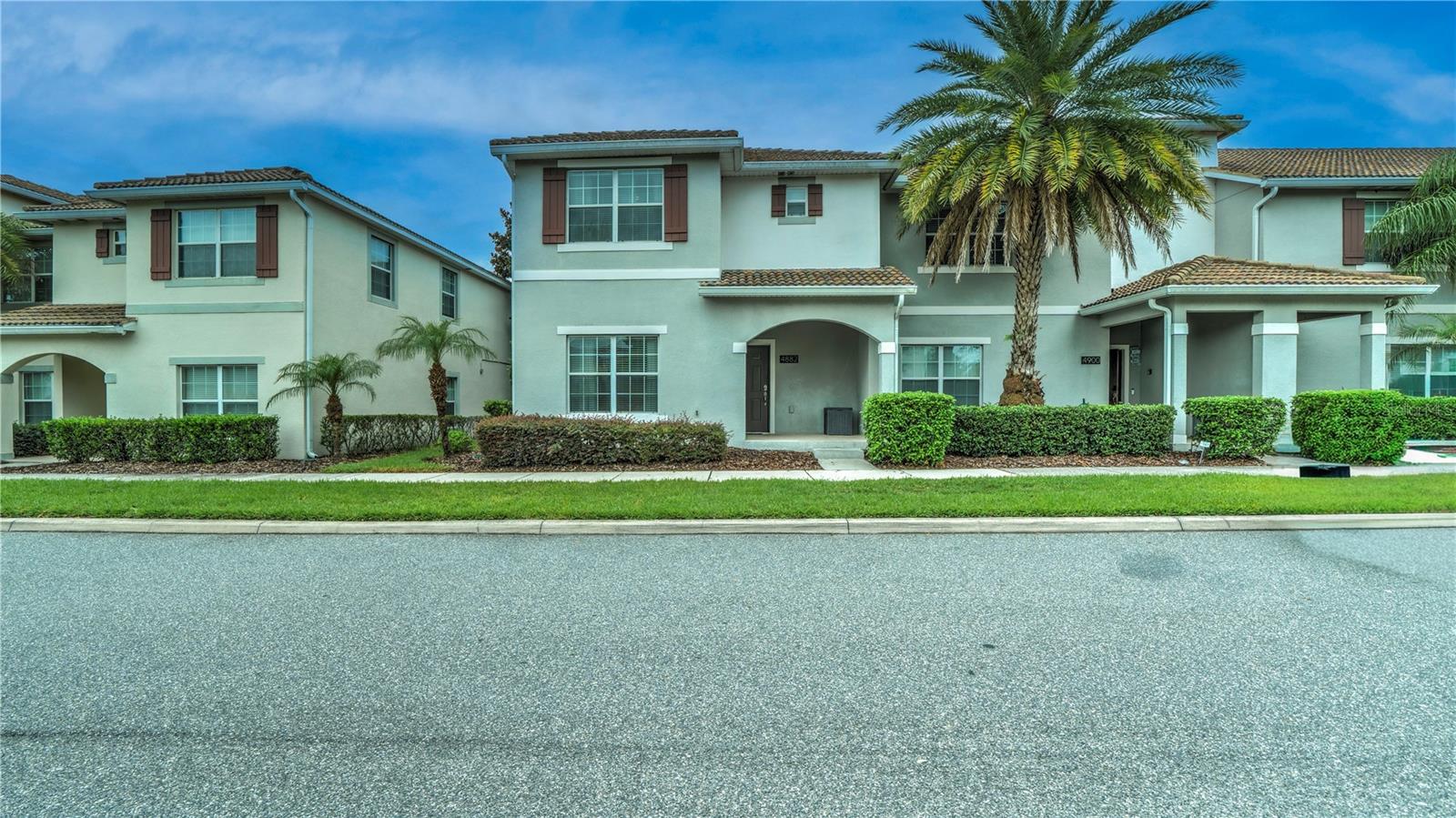 Discover one of the best investment opportunities near Disney. Competitively priced, this fully furnished 5-bedroom, 4-bathroom townhome in Storey Lake Resort, this fully furnished, turnkey property is located in a gated, short-term-rental-approved community. Offering over 2,100 square feet, the home features an open-concept layout, granite countertops, stainless steel appliances, two bedrooms on the main floor, two en-suite bedrooms upstairs, and a private screened heated pool with a covered lanai. Whether you're looking for an Airbnb investment, vacation home, or second home, this property is ready to enjoy or generate income from day one. Storey Lake's resort-style amenities include pools, a lazy river, water slides, a fitness center, tiki bar, mini golf, sports courts, and kayak rentals, all just minutes from Walt Disney World, Universal Orlando, shopping, dining, and major highways. Competitively priced to sell, this is one of the best values available in Storey Lake.