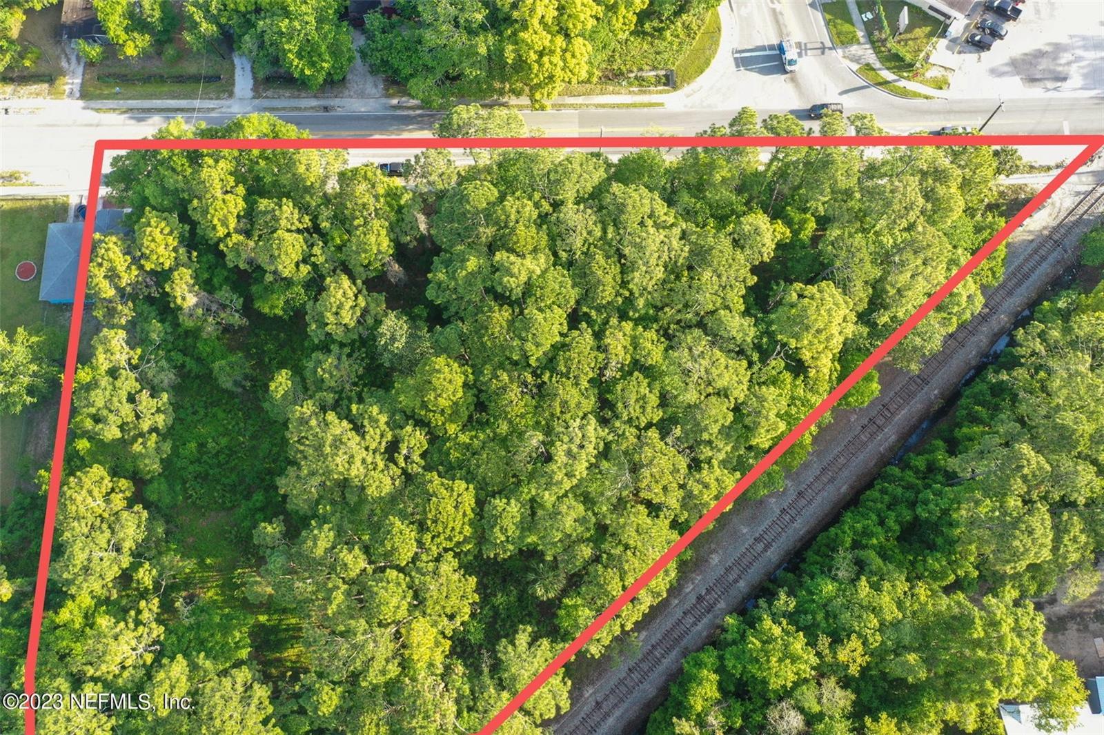 1.6-acre commercial land parcel on W. King Street in St. Augustine, Florida -- located within the West Augustine Commercial Overlay District in St. Johns County's 32084 ZIP code. The site carries 11,000 annual average daily traffic count on W. King Street and sits two miles west of downtown St. Augustine's historic district. The West Augustine Overlay designation allows multi-family, commercial, and mixed-use development by right -- without the need to rezone to a Planned Unit Development. Permitted uses include financial institutions, medical and professional offices, retail goods stores, specialty food stores, take-out restaurants, service businesses, mini warehouses, spas and gyms, gas stations, supermarkets, child and adult care facilities, art galleries, and more. Flexible design standards reduce setbacks, buffering, screening, and parking requirements, increasing the developable footprint of the parcel. The overlay district encompasses approximately 2,155 acres in West

Augustine, a community identified by St. Johns County as an economic development priority. Florida Memorial University is actively developing 340+ acres within the district. Family Dollar has opened as the first national retailer to anchor the corridor. Economic incentives are available on a case-by-case basis through the St. Johns County Economic Development Office.

The property consists of multiple assembled parcels with direct W. King Street frontage. No HOA. No CDD. Access via US-1 north to W. King Street. Highways serving the corridor include I-95, I-10, US-1, SR-16, and SR-207. Northeast Florida Regional Airport and Jacksonville International Airport are both accessible from this location.

901 W. King Street is positioned at the early stage of a county-supported commercial revitalization -- offering land area, traffic exposure, and overlay flexibility that smaller infill parcels in this corridor cannot match.
