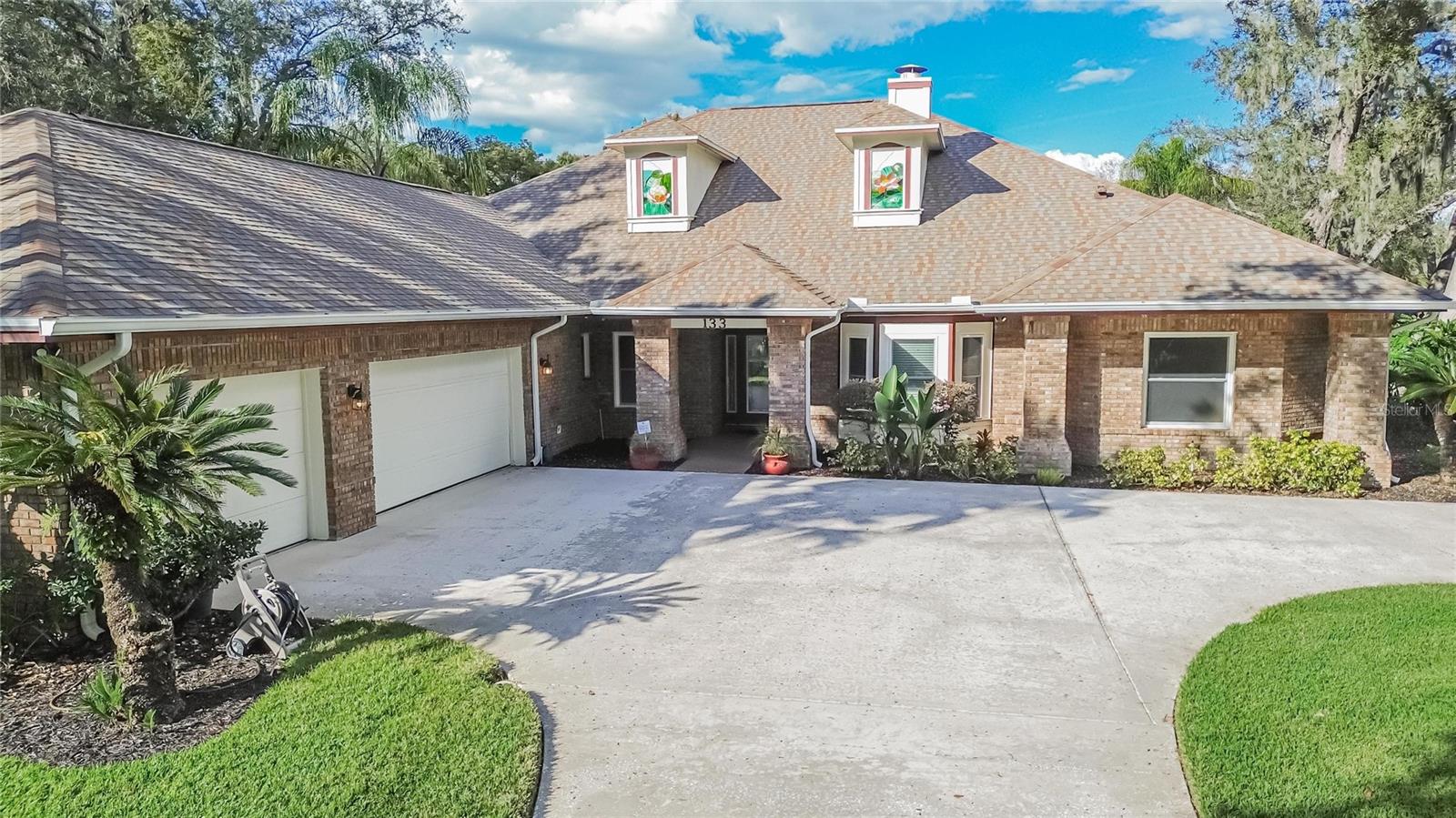Welcome to 133 Barrington Drive in Brandon, FL—a private Florida retreat set on an expansive .43-acre corner lot within a gated community, where
space, comfort, and resort-style living converge. Ideally located just minutes from Brandon Mall, the home also enjoys close proximity to a wide variety
of dining options and family-friendly entertainment, offering the perfect balance of privacy and everyday convenience. This impressive 4-bedroom, 3.5-
bath residence offers peace of mind with upgraded windows, upgraded interior doors, and a roof replaced just three years ago. A large double-sided
driveway leads to the spacious 3-car garage, providing ample parking and storage—ideal for guests, recreational vehicles, or everyday
convenience.Inside, a striking double-sided fireplace anchors the entry, seamlessly connecting the formal living room and great room—an inviting
backdrop for holidays, celebrations, and everyday moments that turn into lasting family memories. The luxurious primary suite serves as a true
sanctuary, featuring a built-in, in-ground spa overlooking a custom fish tank, creating a one-of-a-kind retreat at the end of the day. A standout feature
is the private mother-in-law suite, complete with its own bathroom and direct pool access, making it ideal for multi-generational living, extended guests,
or a private space for family and friends.Step outside and embrace the Florida lifestyle in the screened-in, in-ground swimming pool, surrounded by
elegant brick pavers—perfect for weekend gatherings, poolside dinners, and unforgettable summer memories. The oversized, beautifully landscaped
corner lot offers privacy and endless opportunities to customize, from an outdoor kitchen to play areas or additional entertainment spaces. This
exceptional property delivers the space, comfort, and location families desire—a place to grow, gather, and create memories for years to come, all while enjoying the best of Brandon living.