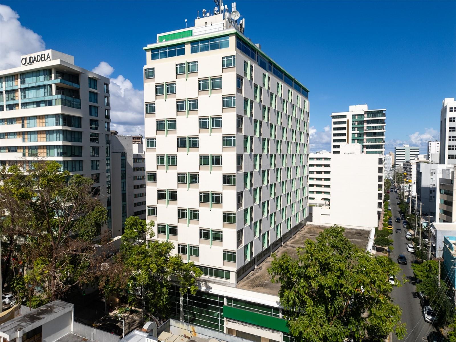 Modern Office Space in Santurce’s Premier Business District: Located in one of Santurce’s most sought-after commercial areas, this beautifully designed office space sits on the 12th floor of the First Bank building, right next to Ciudadela. Recently renovated with modern, breezy touches, the space offers abundant natural light, high exposed ceilings, and panoramic views of Condado and Santurce.

Spanning 8,300 sq. ft., the space is fully furnished and features 10 private offices, a gym, and an open-concept layout ideal for small to medium creative firms. Tenant pays for CAM.

Conveniently within walking distance of Lote 23, Museo de Puerto Rico, Centro Europa, restaurants, offices, and retail establishments, this prime location offers both business connectivity and lifestyle convenience. The building offers 24-hour security, direct mail service to the suite, a full backup generator, a water cistern, and three underground parking levels.

An excellent opportunity to establish your business in one of Santurce’s most vibrant commercial hubs.