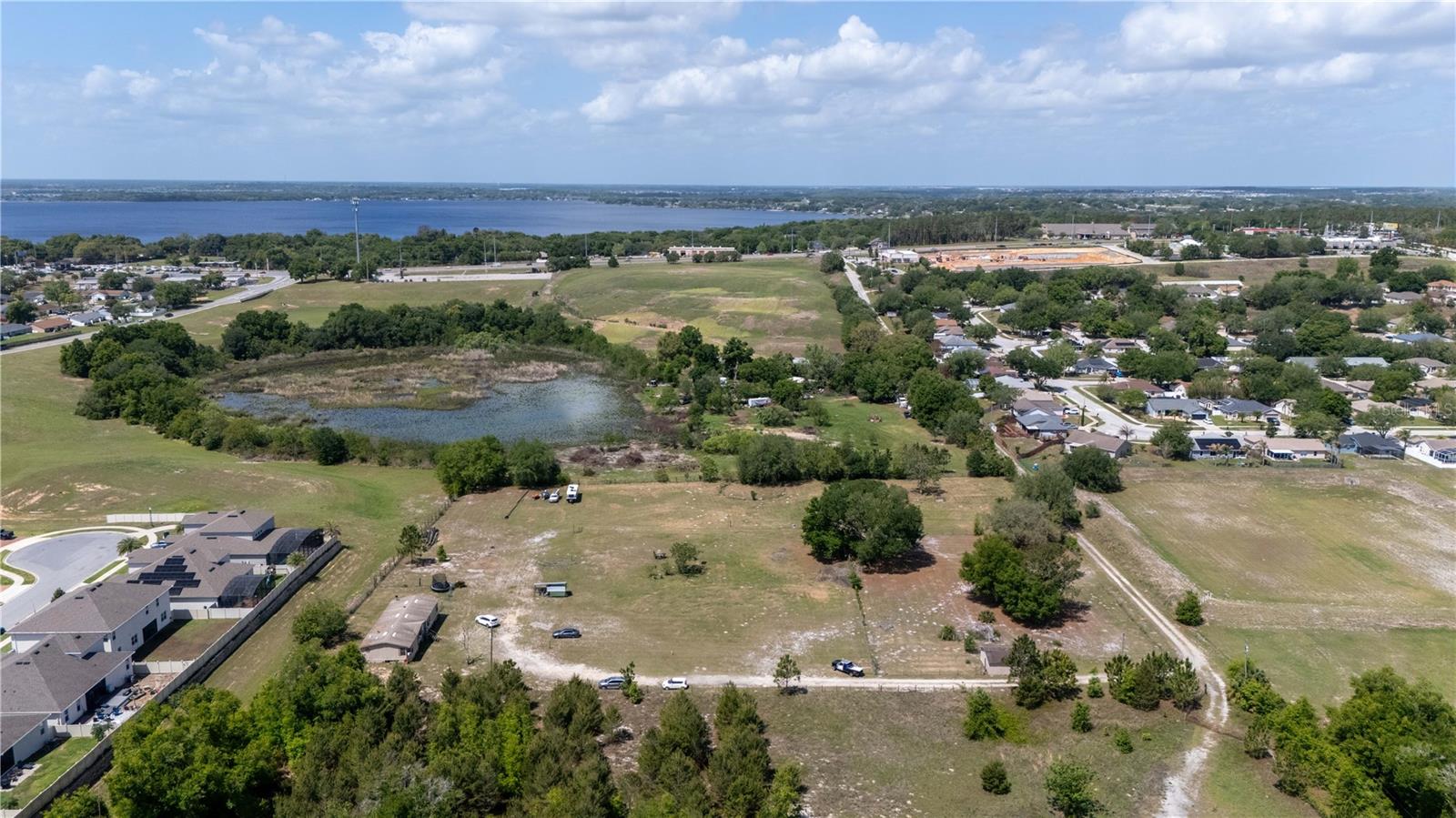 GRASSY LAKE ESTATES 12606 S. Grassy Lake Rd. | Minneola, FL 34715 Price: $899,000 Rare 5-acre opportunity located in one of Lake County’s fastest-growing corridors. Whether you’re a developer, investor, horse enthusiast, or simply seeking a private estate with room to spread out, this property offers exceptional flexibility and long-term value. Featuring an existing residence, expansive acreage, and road frontage along South Grassy Lake Road, this property presents multiple possibilities. Create your dream equestrian estate, private family compound, hobby farm, luxury homestead, or hold for future appreciation as the surrounding area continues to experience significant residential growth. With no HOA restrictions, there is ample room for horses, barns, workshops, RVs, boats, trailers, recreational vehicles, and outdoor toys. Enjoy the privacy of country living while remaining minutes from major highways, shopping, dining, medical facilities, and employment centers. Conveniently located near US-27, the Florida Turnpike, Clermont, Minneola, and the rapidly expanding Wellness Way corridor, this property offers both immediate enjoyment and future potential. Future development opportunities may exist subject to zoning, engineering, utility availability, environmental review, and governmental approvals. Property Highlights  Approximately 5 Acres  Existing Residence Included  No HOA  Horse Property / Equestrian Potential  Private Estate or Family Compound Opportunity  Room for Barns, Workshops & Agricultural Uses  Bring Your RVs, Boats, Trailers & Recreational Vehicles  Outdoor Lifestyle Property  Road Frontage on S. Grassy Lake Road  Located Within a High-Growth Corridor  Minutes to US-27 & Florida Turnpike  Near Shopping, Dining, Medical Facilities & Employment Centers  Builder Opportunity  Development Potential Subject to Approvals Land Banking Opportunity  Surrounded by Existing & Future Residential Growth  Potential Estate Home Community Opportunity  Potential Residential Development Opportunity Ideal Buyers • Developers & Builders • Investors • Horse Owners • Equestrian Enthusiasts • Luxury Estate Buyers • Multi-Generational Families • RV & Boat Owners • Homesteaders • Land Banking Investors • Outdoor Lifestyle Buyers Location Highlights • Approx. 10 Minutes to Downtown Minneola • Approx. 10 Minutes to Downtown Clermont • Approx. 15 Minutes to Montverde • Approx. 15 Minutes to Winter Garden • Approx. 30 Minutes to Downtown Orlando • Convenient Access to US-27, Florida Turnpike, SR-429 & Wellness Way • Acreage • Horse Property • Equestrian • Estate Home Site • Luxury Estate • Family Compound • RV Parking • Boat Parking • Workshop Potential • Development Opportunity • Builder Opportunity • Investment Property • Land Banking • Growth Corridor • Residential Development • Existing Home Included • No HOA • Buildable • Agricultural Potential • Outdoor Lifestyle Property 5 Acres in Minneola | Horse Property • Estate Oasis • RV & Boat Friendly • Existing Home Included • No HOA • Development Potential

Contact Today. Do Not Walk the Property without Permission. 
Thanks.  ____________________________________________
Build Lake County________________

Build Florida Real Estate